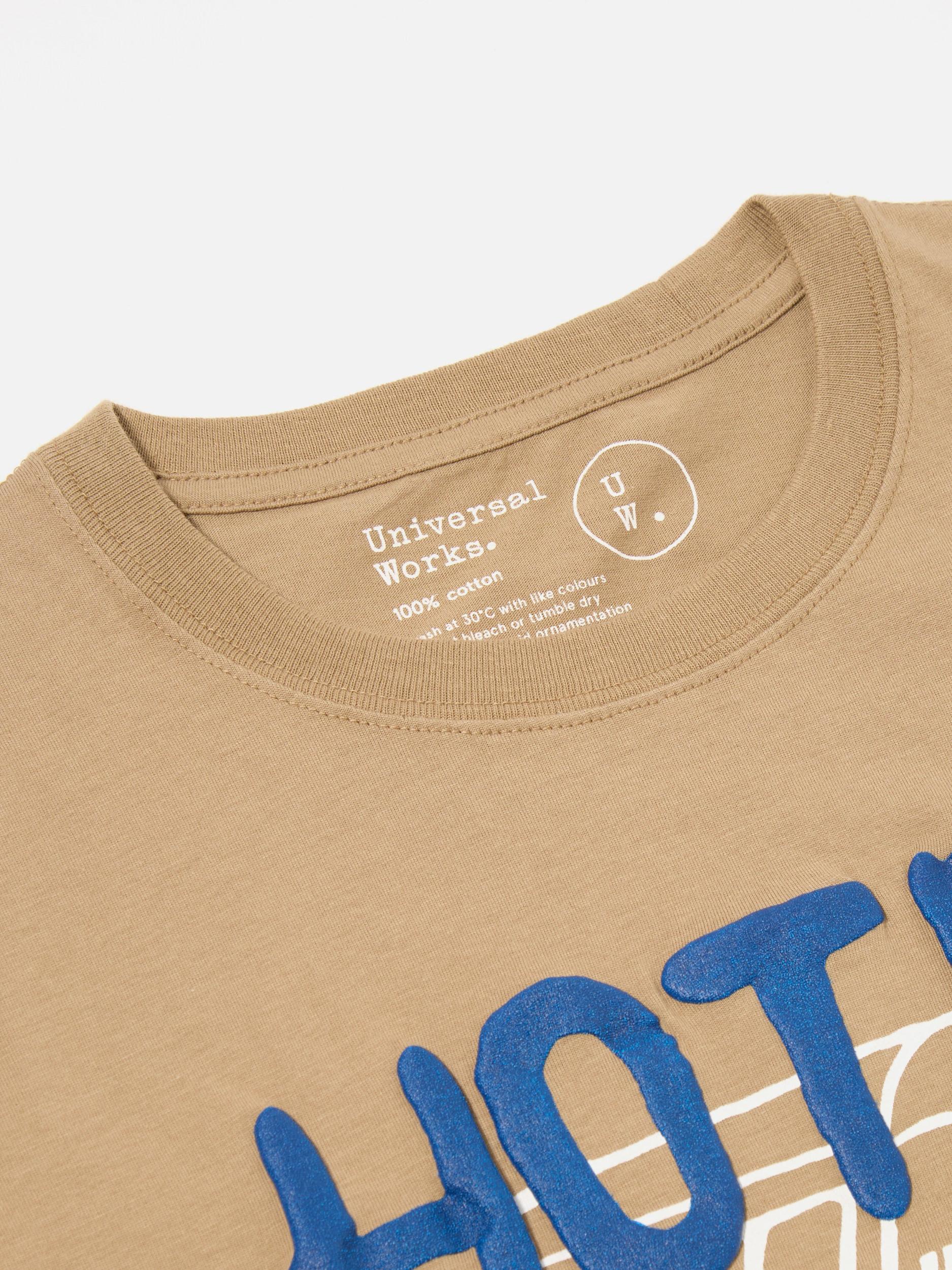 Universal Works Print Tee in Sand 'Hotel Deluxe' Single Jersey Product Image