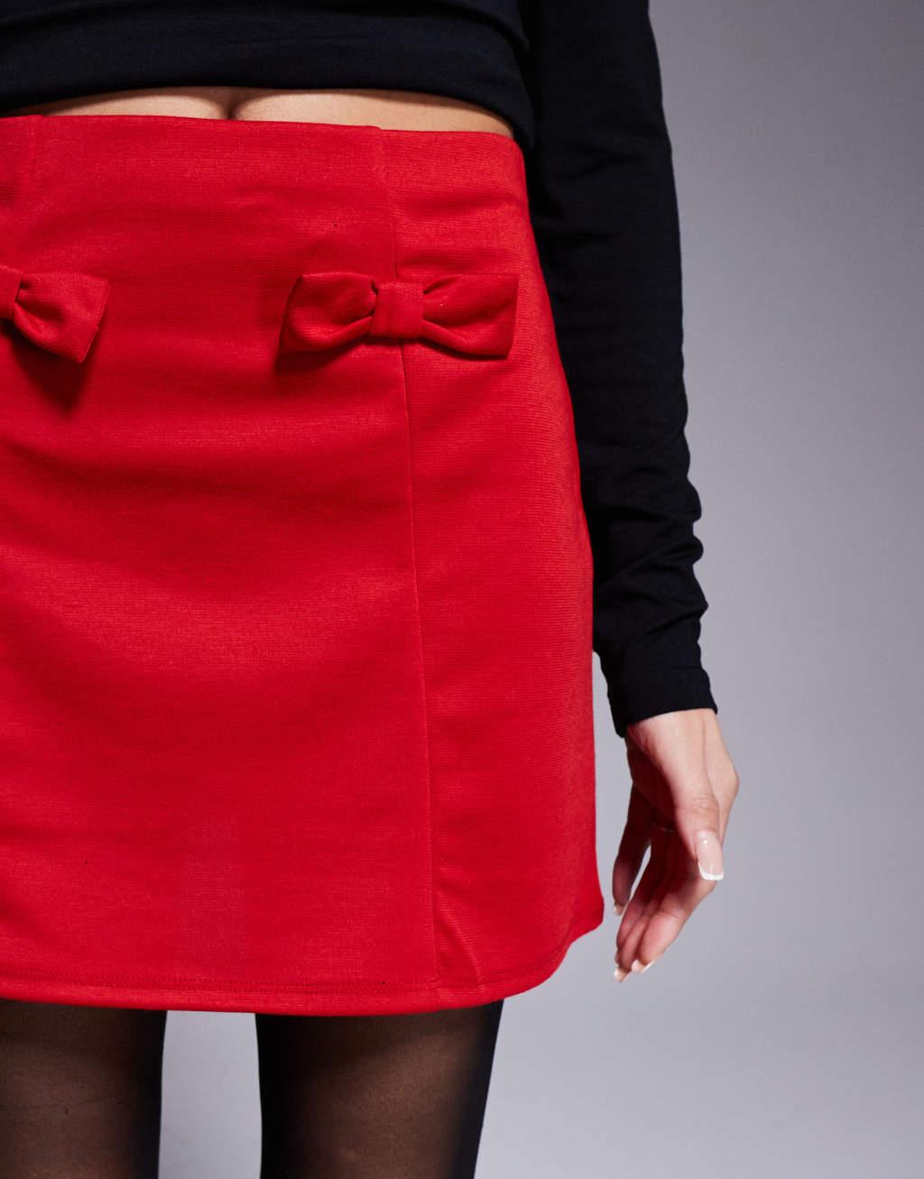 ASOS DESIGN a-line mini skirt with bow details in red Product Image