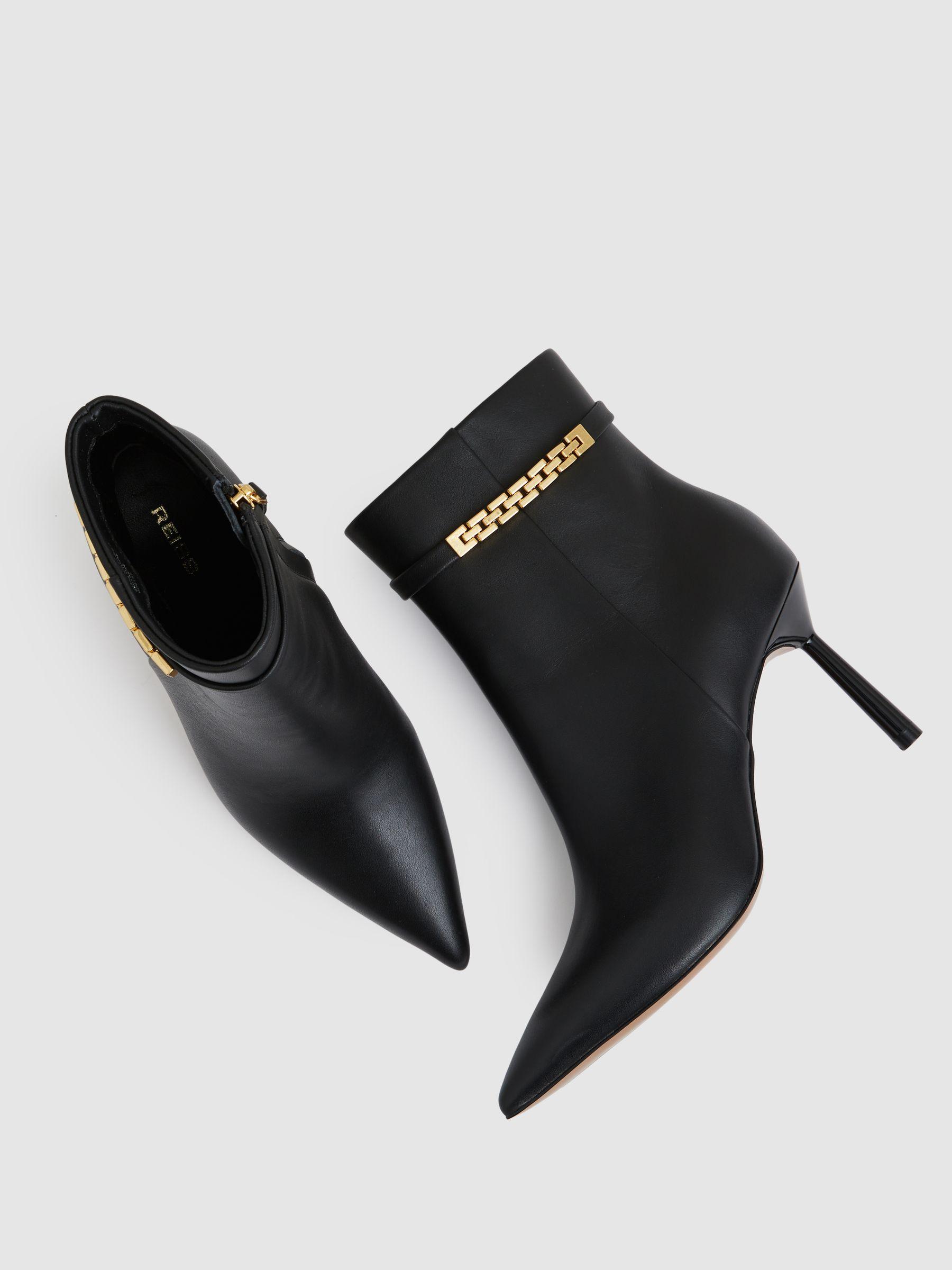 Leather Chain Embellished Ankle Boots in Black Product Image