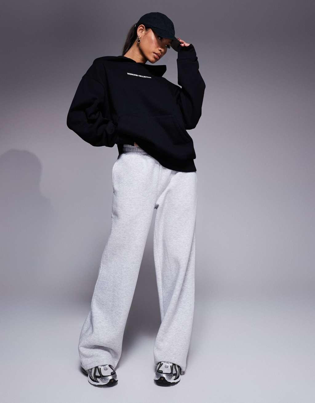 Weekend Collective oversized hoodie with stacked back logo in black Product Image