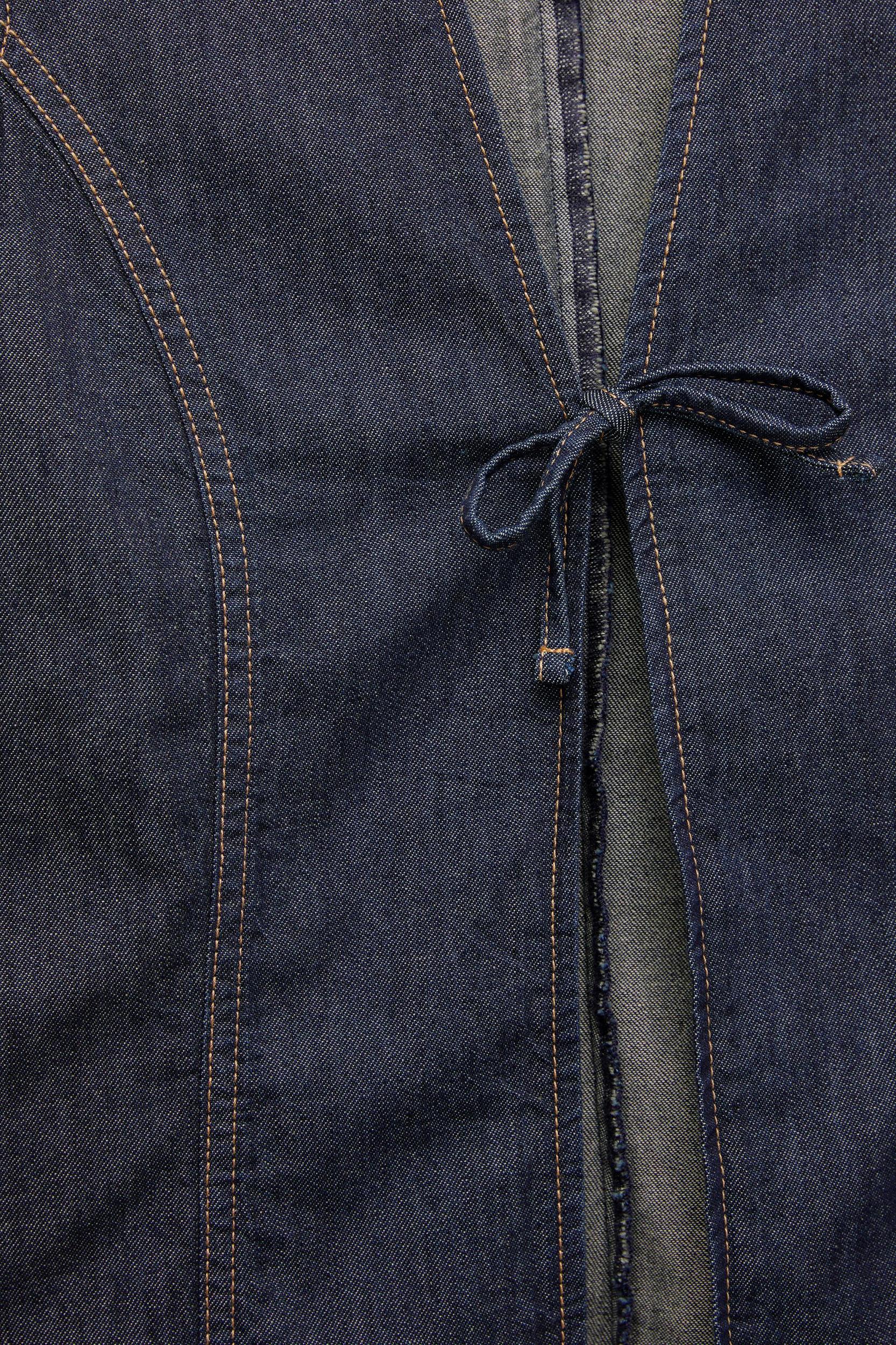 Denim top with bows Product Image