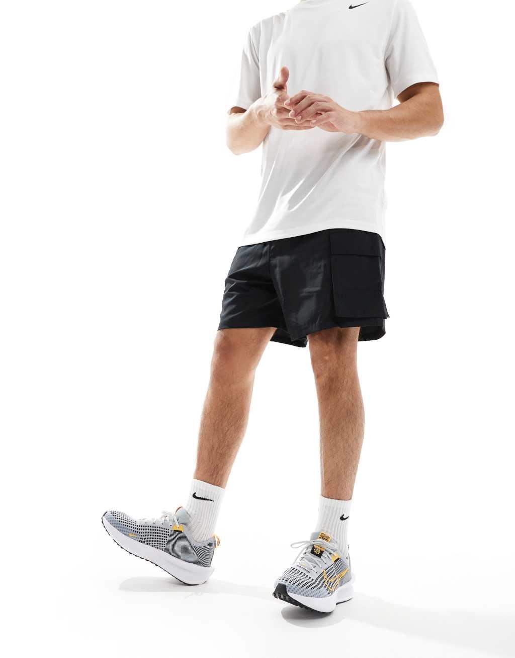 Nike Running Interact Run sneakers in gray and orange Product Image