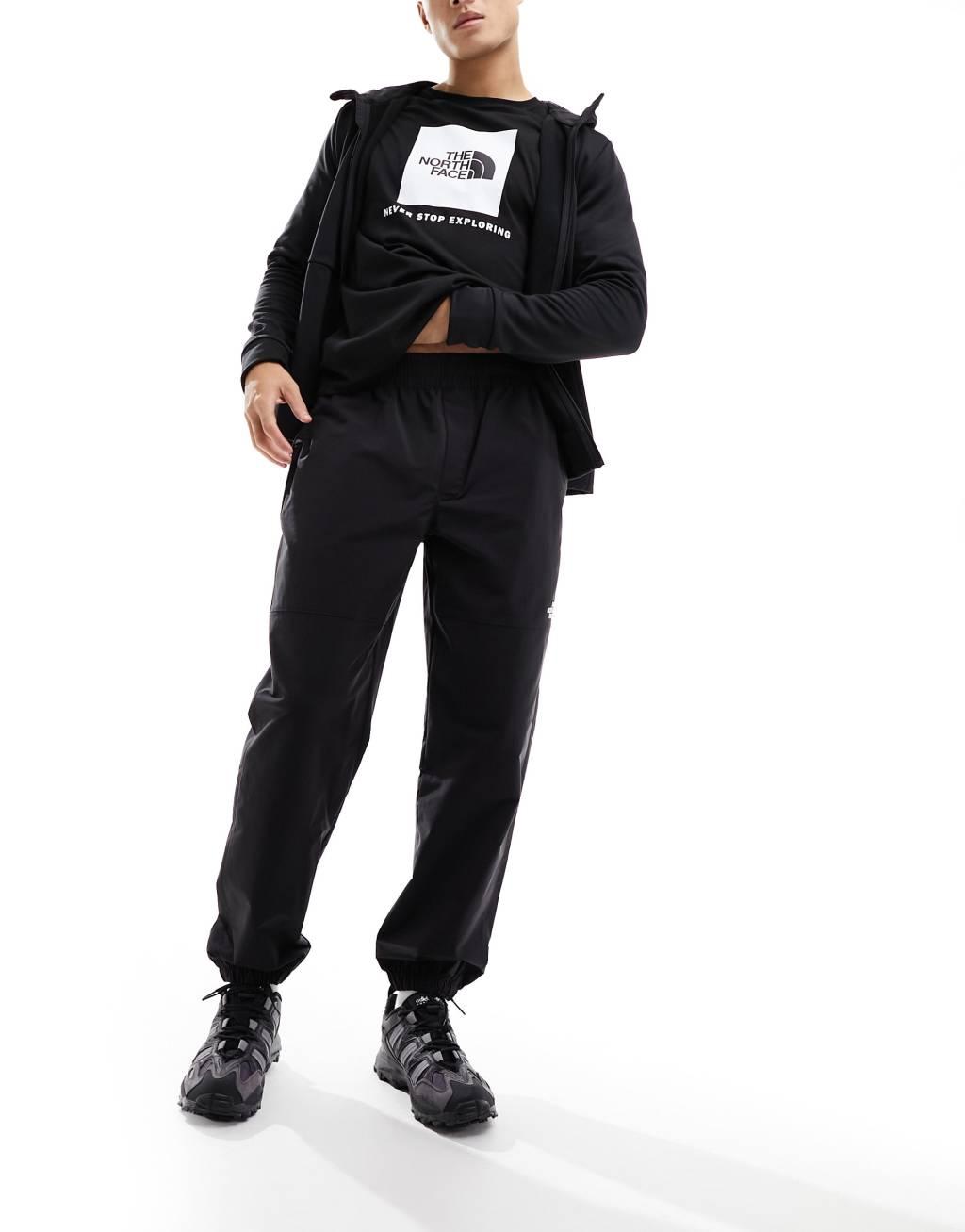 The North Face Easy Wind track pants in black Product Image