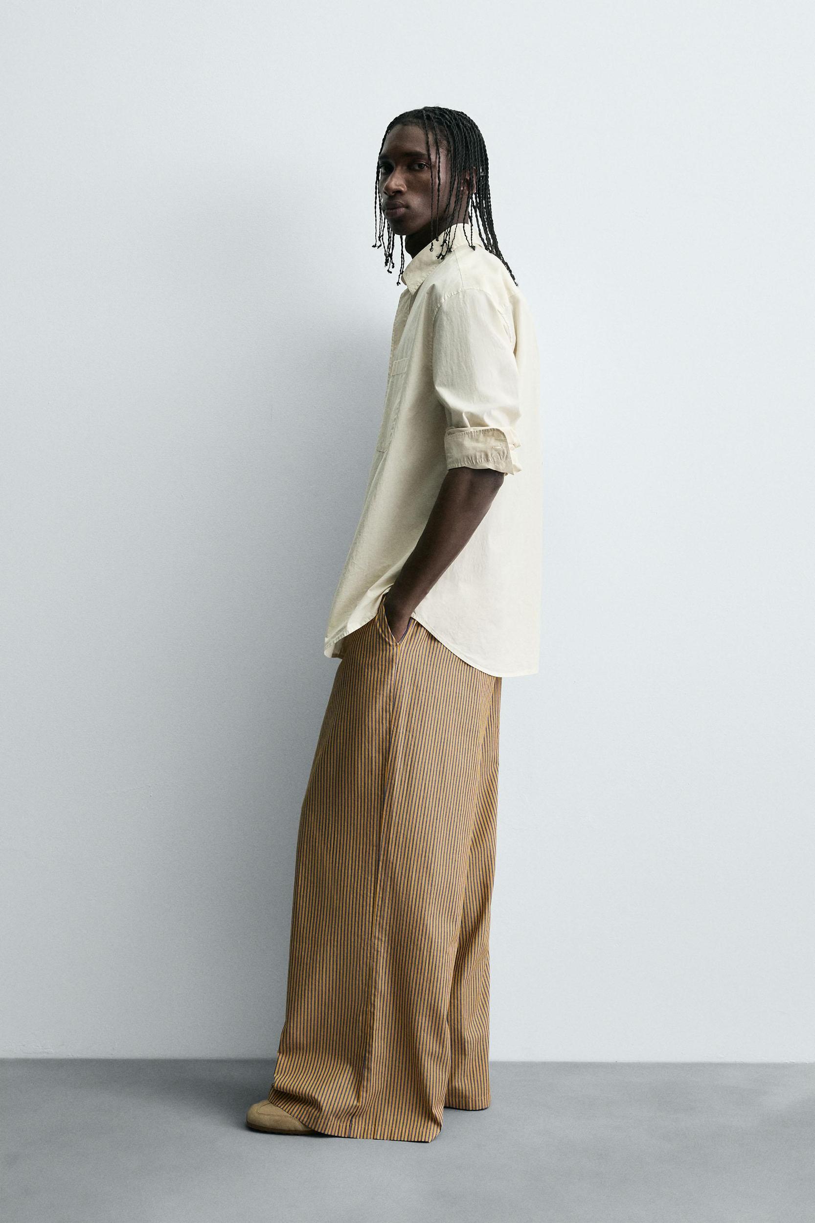 STRIPED OVERSIZED FIT PANTS Product Image