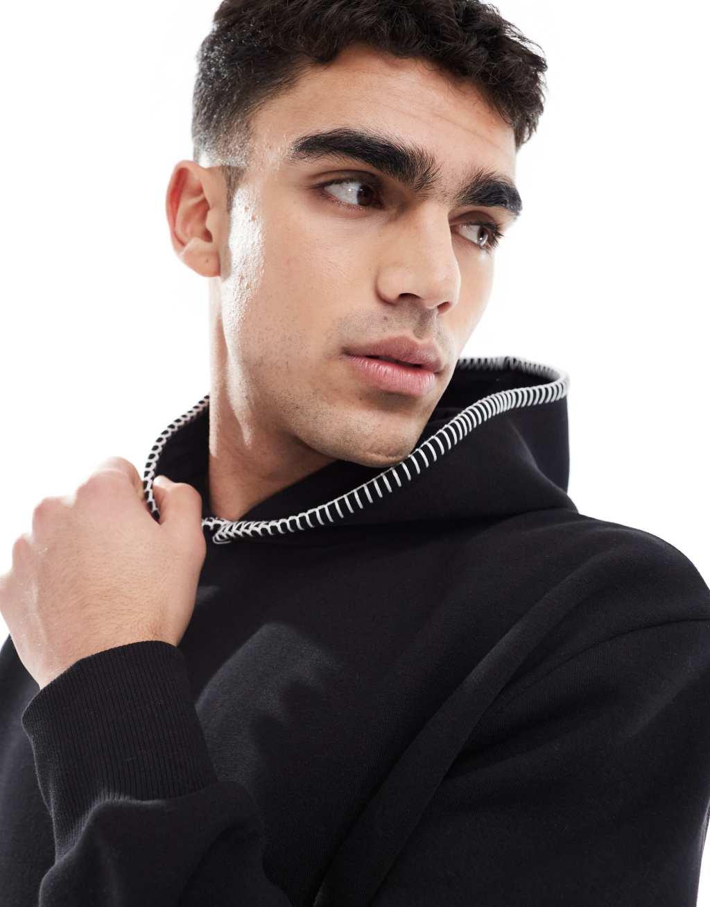 ASOS DESIGN oversized hoodie with stitching detail in black Product Image