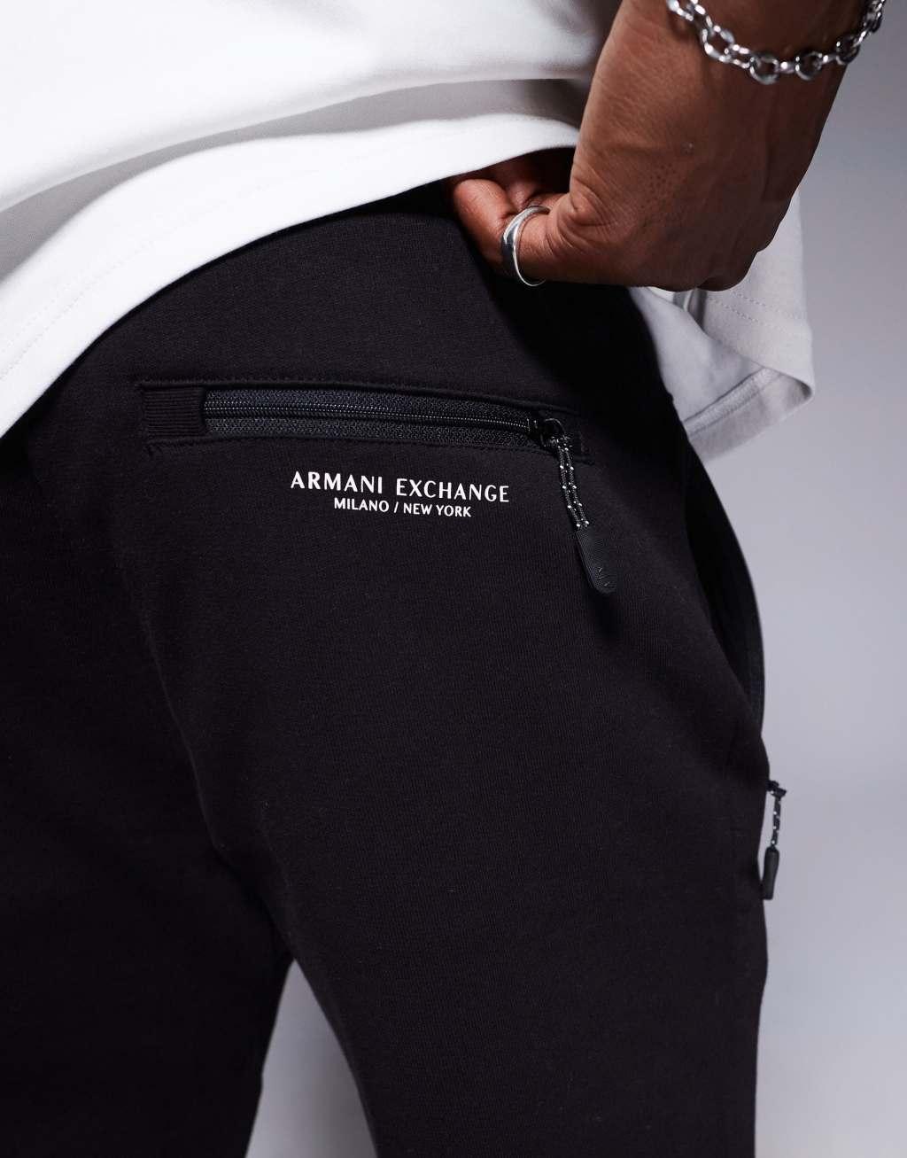 Armani Exchange logo cuffed sweatpants in black Product Image