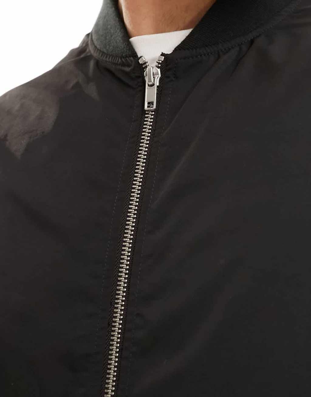 ASOS DESIGN lightweight bomber jacket in black Product Image