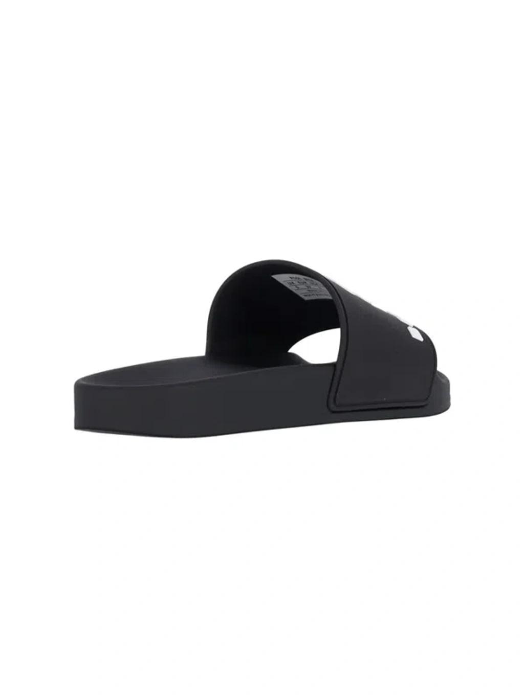 BALENCIAGA Rubber Slide Sandals For The Pool Men In Black White Product Image