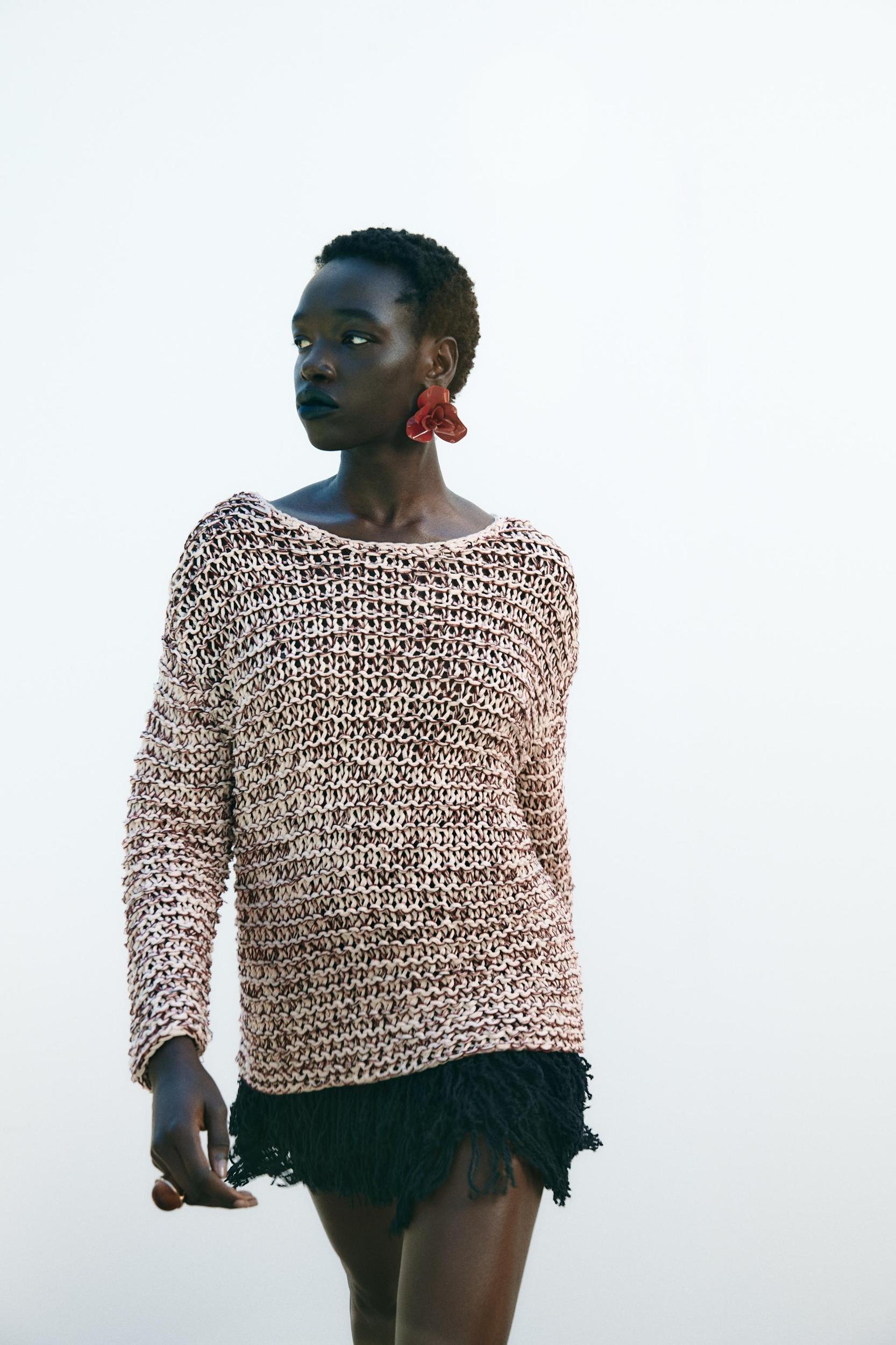 COMBINATION KNIT SWEATER Product Image