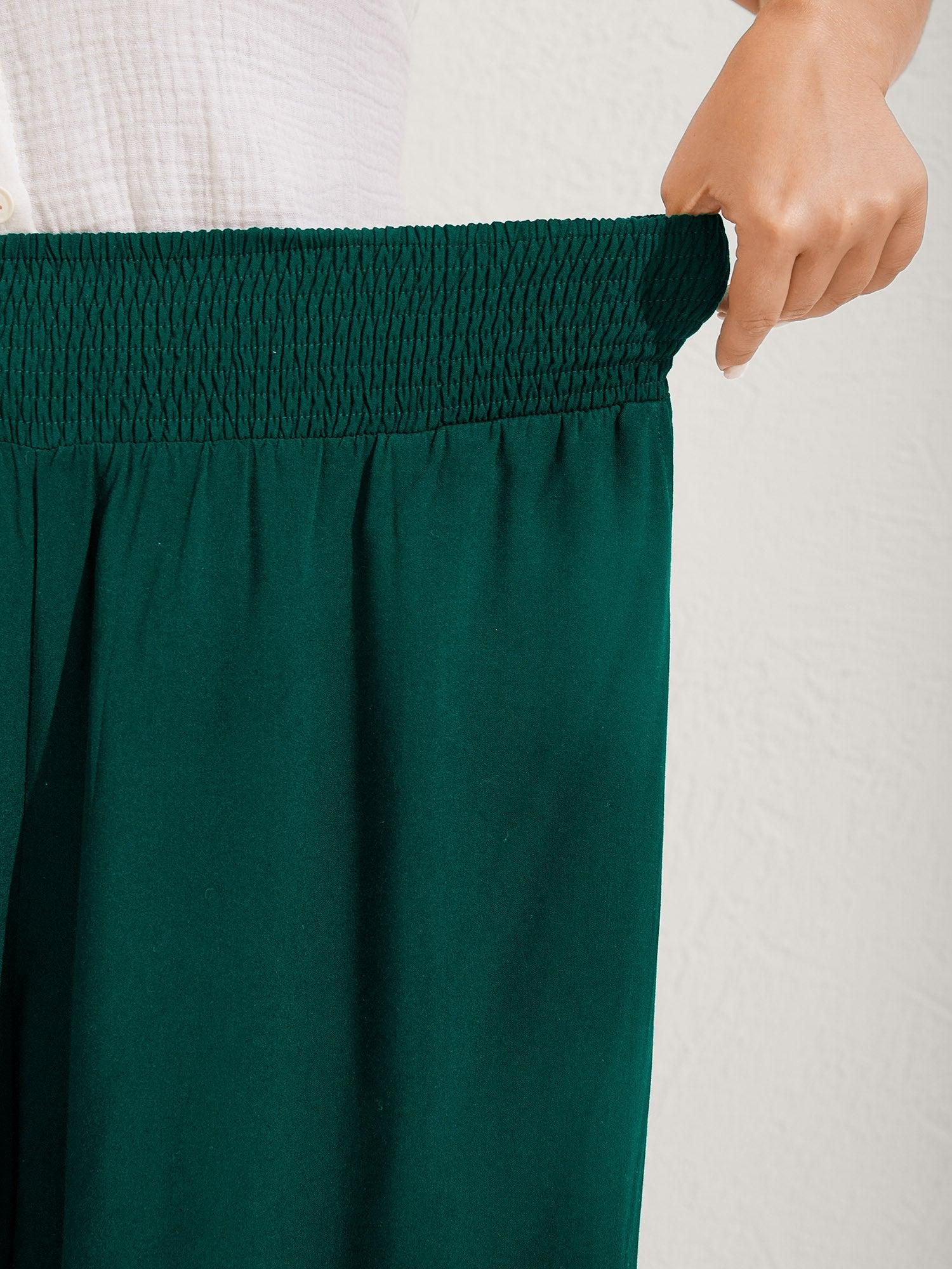 Ruffled Curvy Hem Wide-Leg Pants Female Product Image