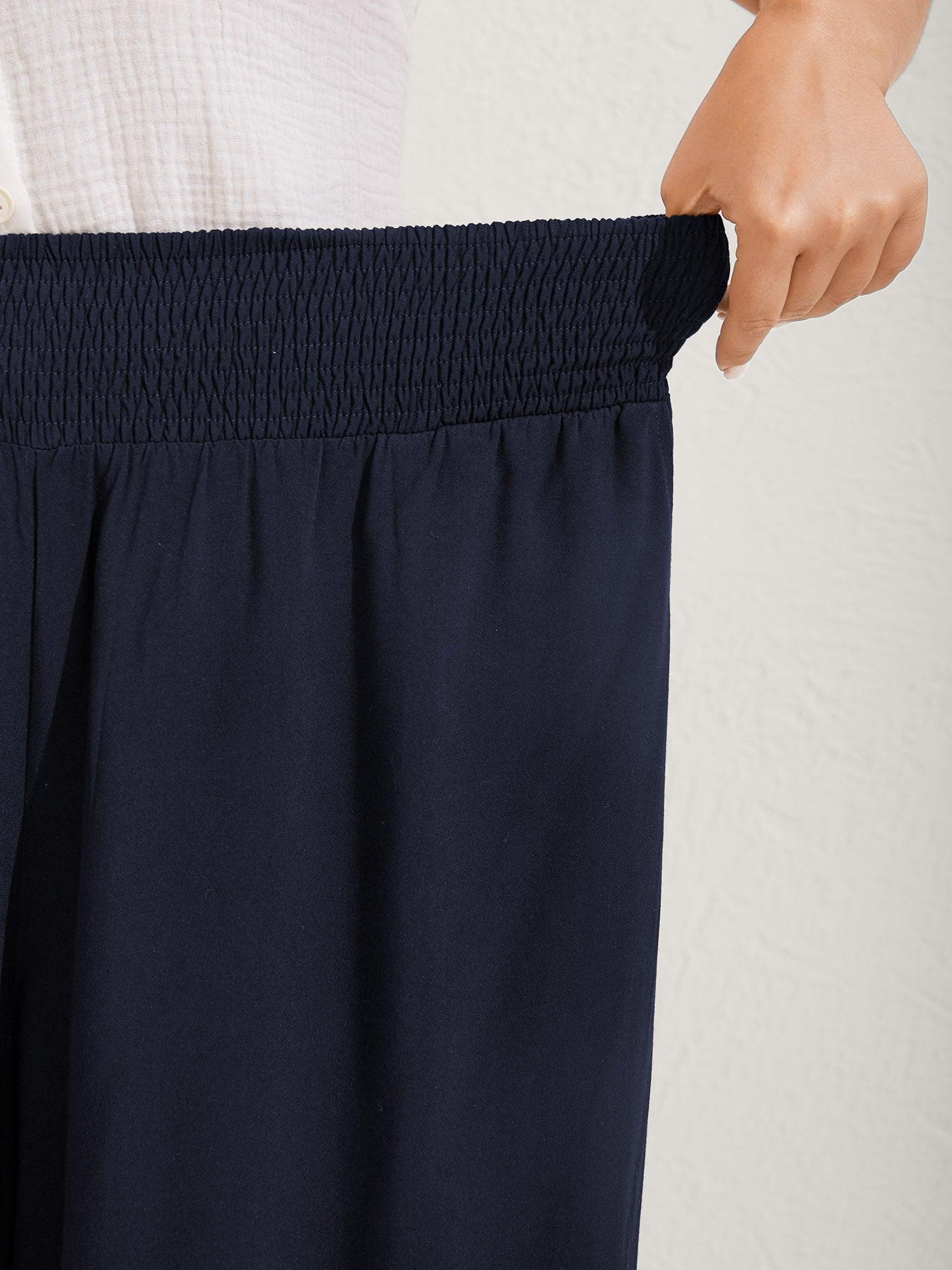 Ruffled Curvy Hem Wide-Leg Pants Female Product Image