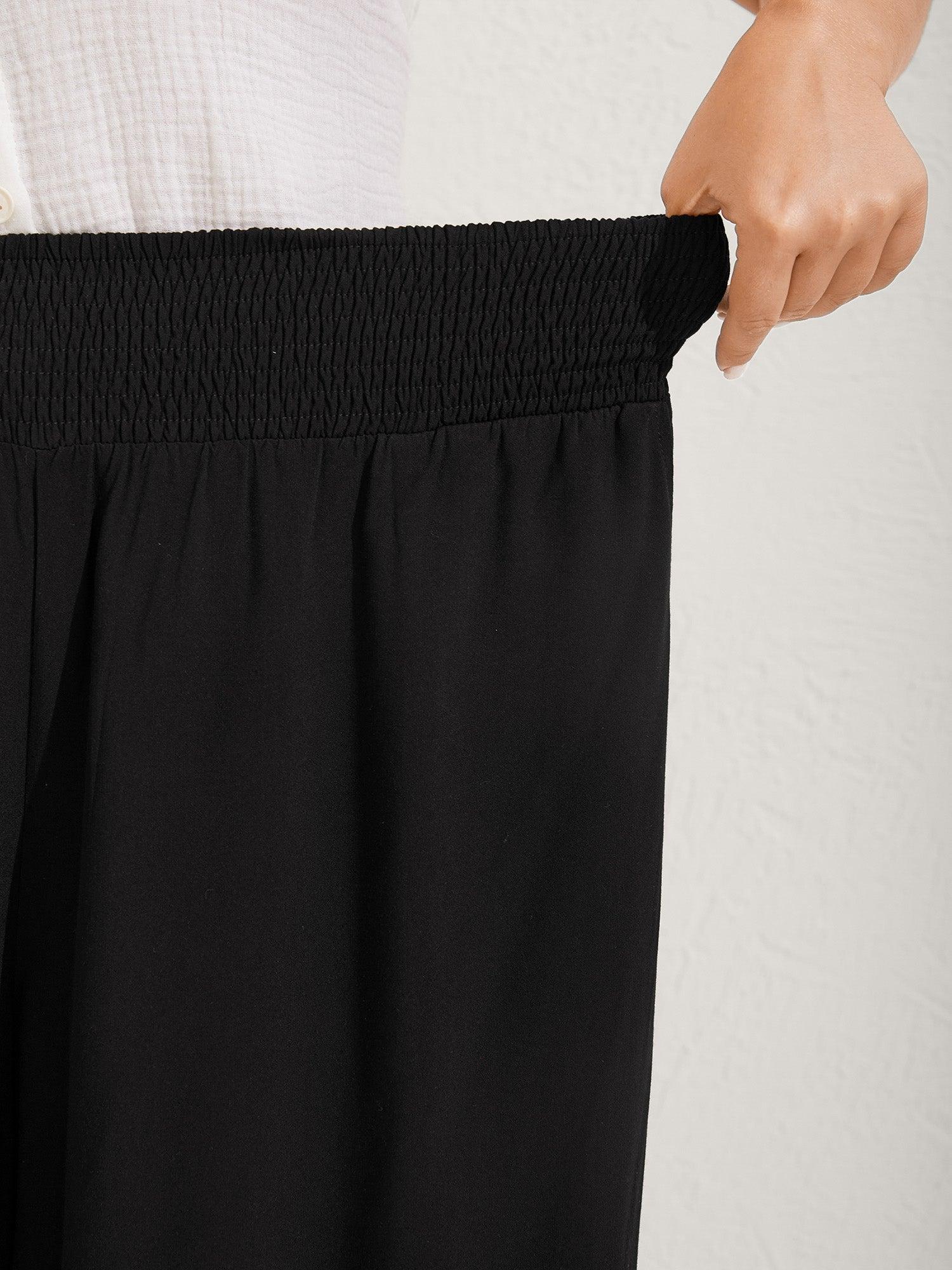 Ruffled Curvy Hem Wide-Leg Pants Female Product Image