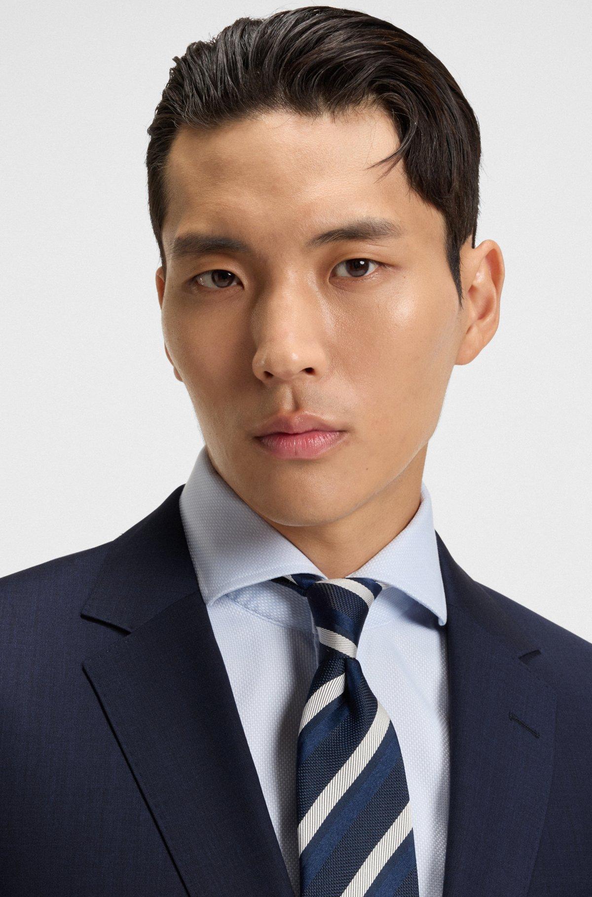 Slim-fit three-piece suit in melange wool Product Image