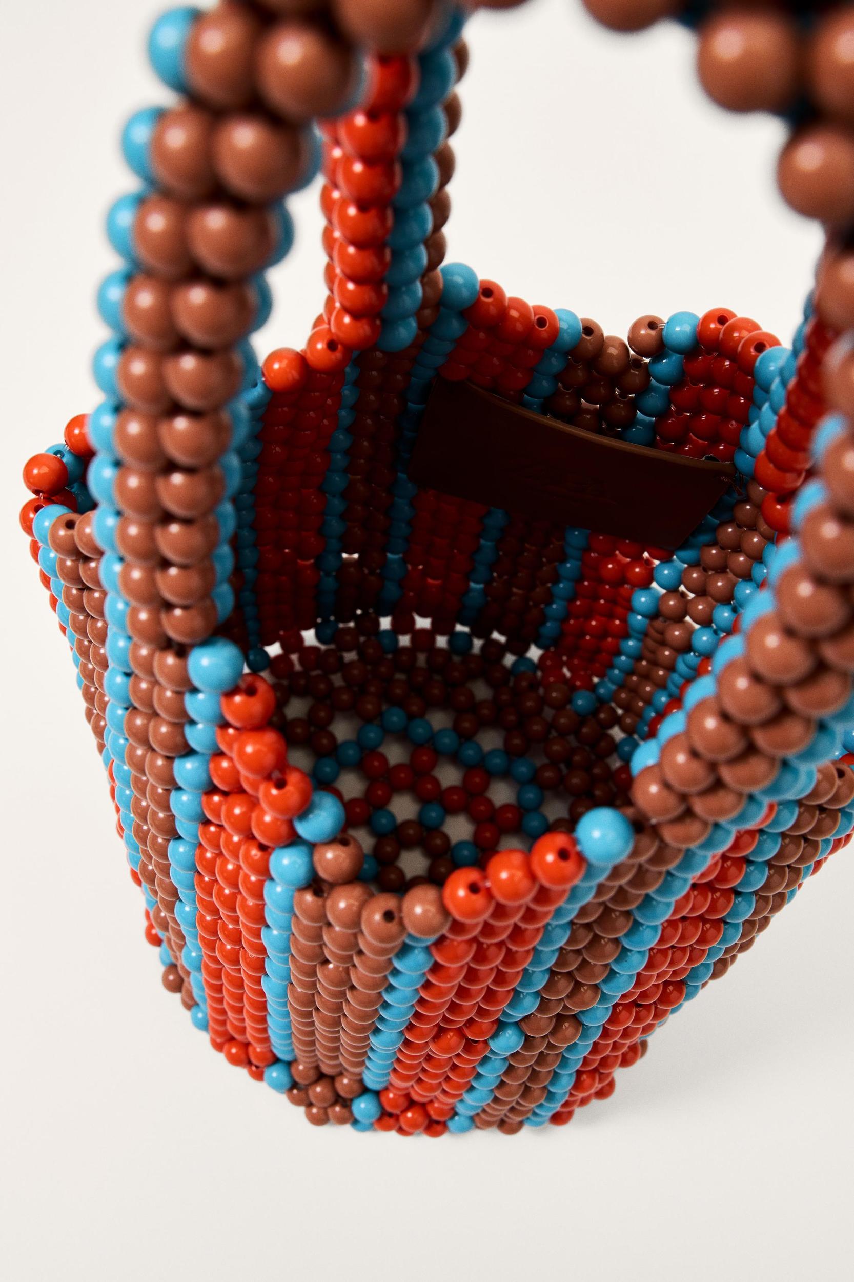 LIMITED EDITION STRIPED WIDE-LEG PANTS Product Image