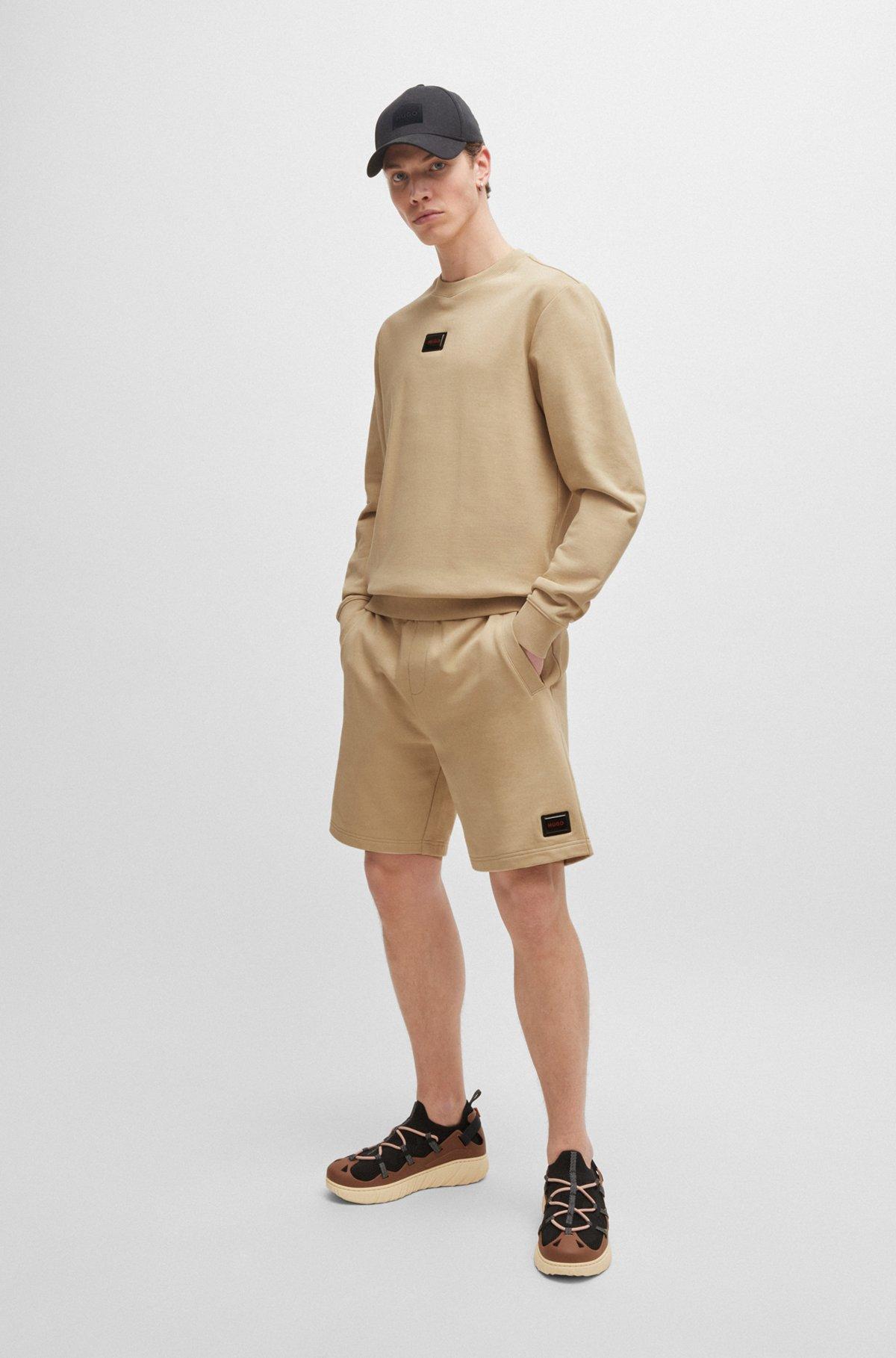 Cotton-terry relaxed-fit shorts with logo trim Product Image