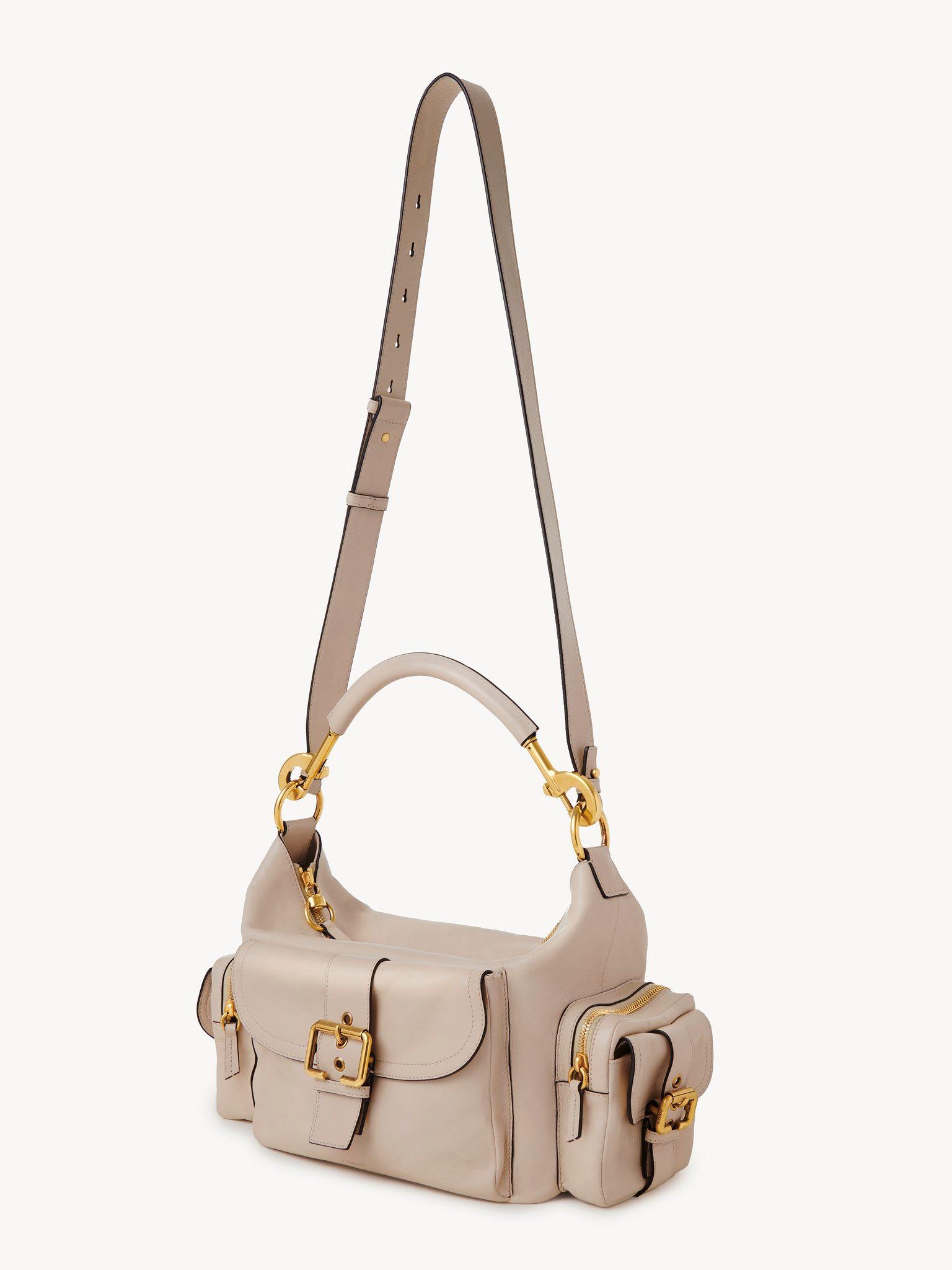 Camera bag in shiny leather Product Image