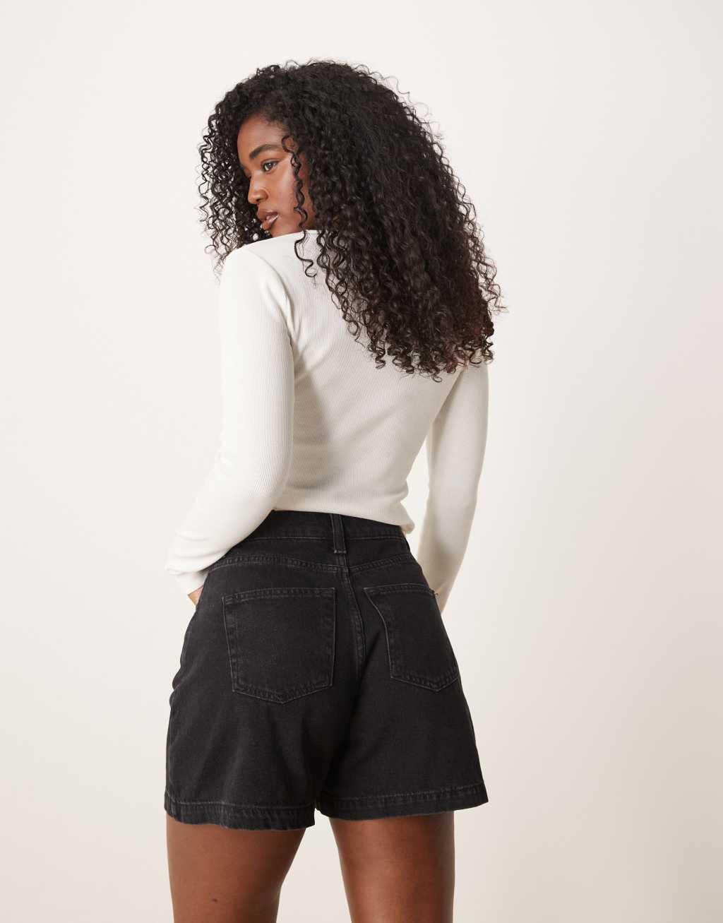 ASOS DESIGN denim longline A-line shorts in black Product Image
