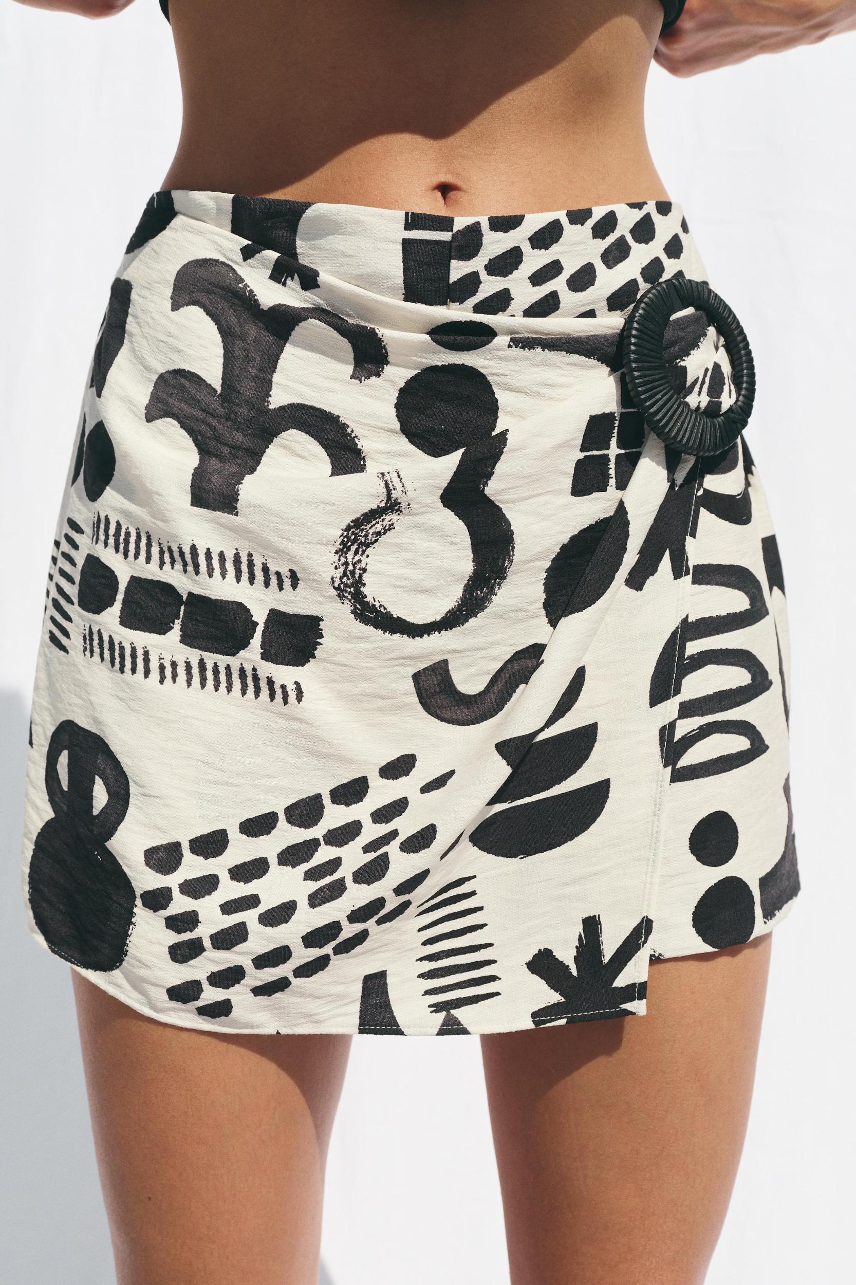 PRINTED BUCKLE MINI SKIRT Product Image