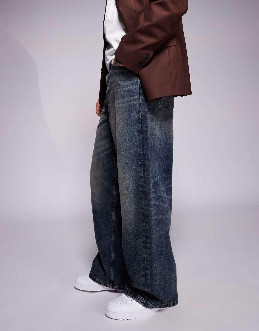 ASOS DESIGN super baggy jeans in mid wash blue Product Image