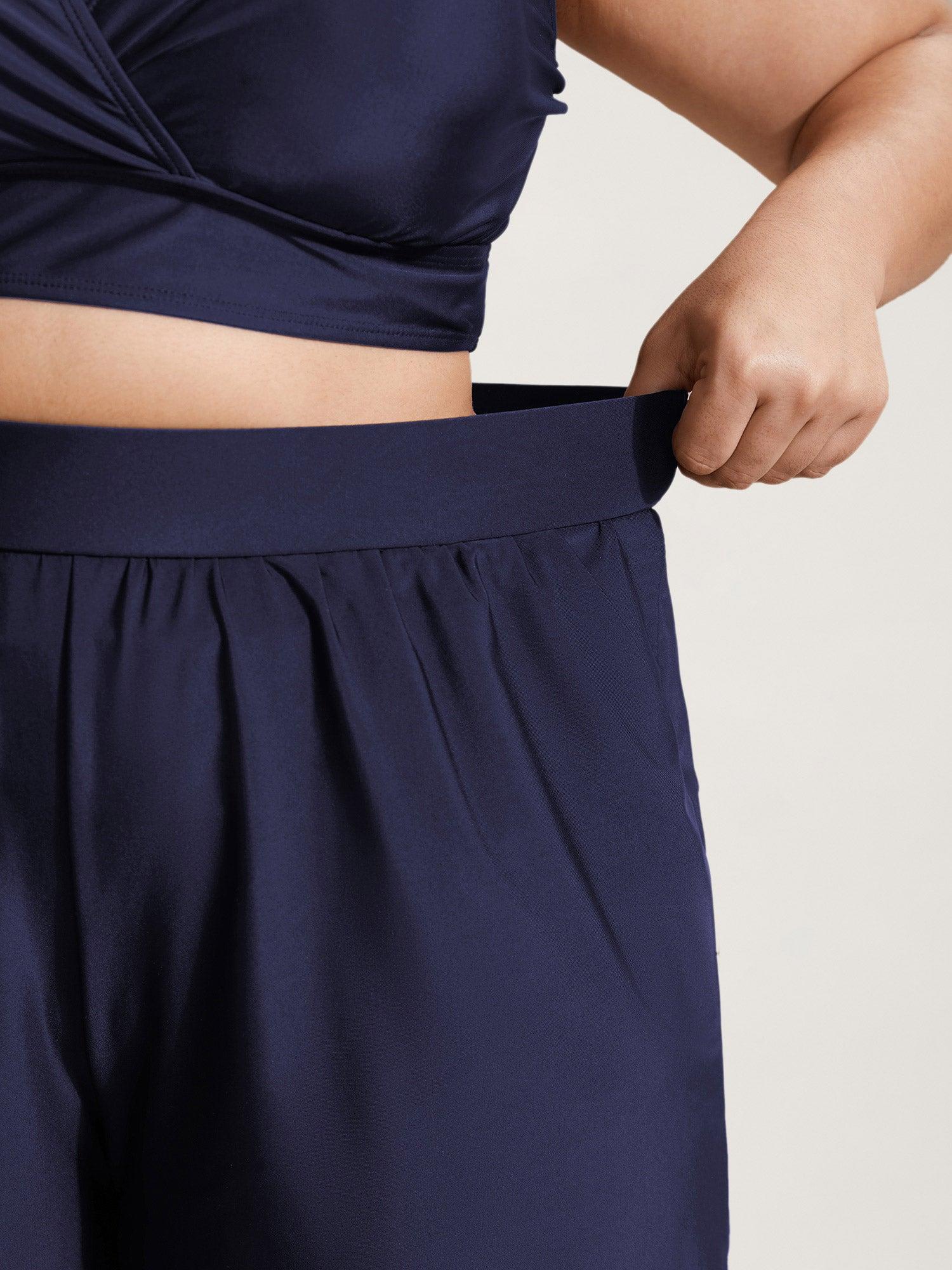 High Waisted Pockets Solid Pleated Swim Bottom Female Product Image