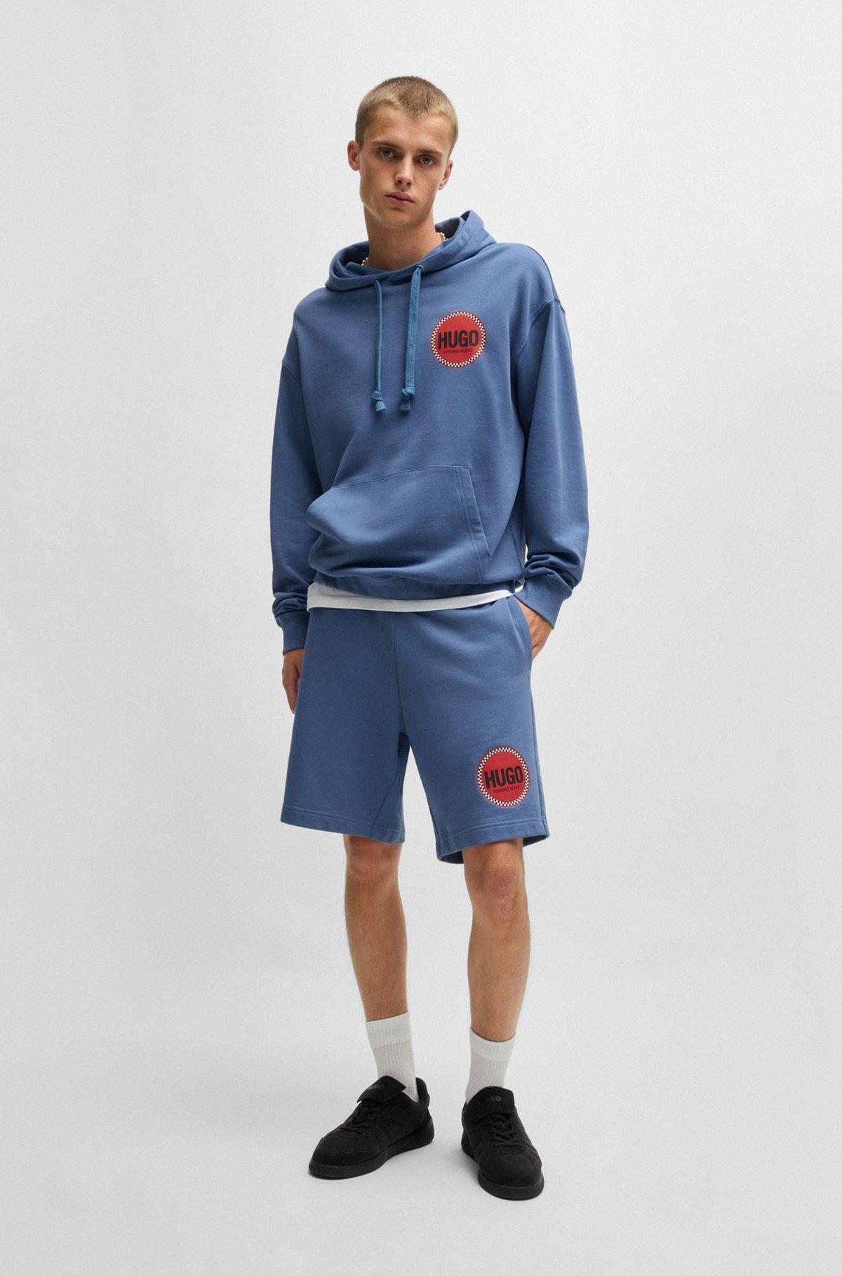 Cotton-terry relaxed-fit hoodie with logo prints Product Image