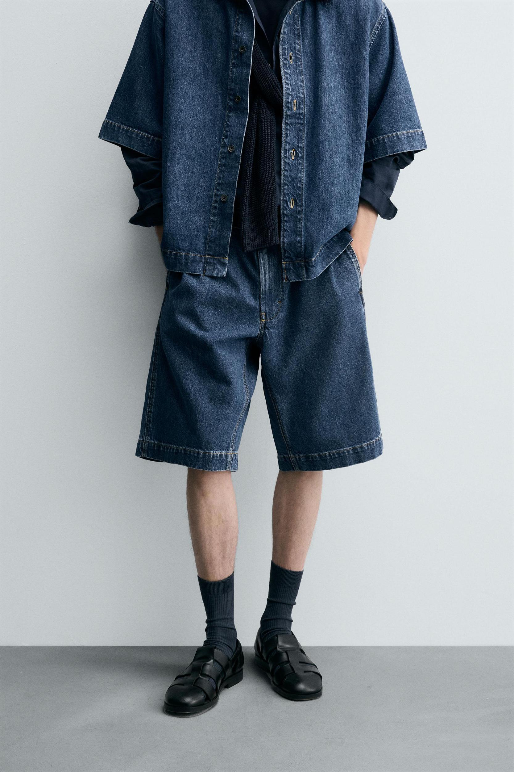 PLEATED RELAXED FIT DENIM SHORTS Product Image