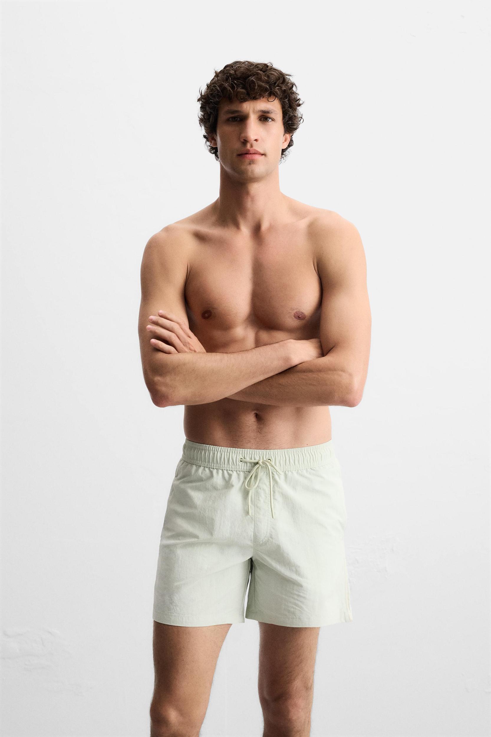 CONTRAST BANDS MID-LENGTH SWIMSUIT Product Image