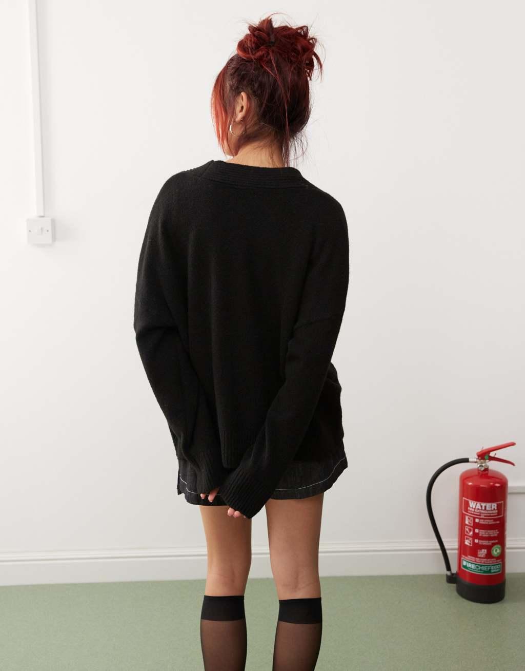 Monki knit button front oversized cardigan in black Product Image