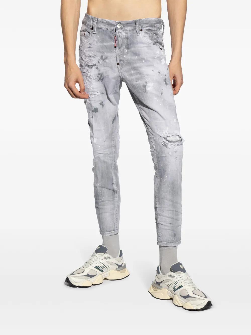 Skater distressed-finish jeans Product Image