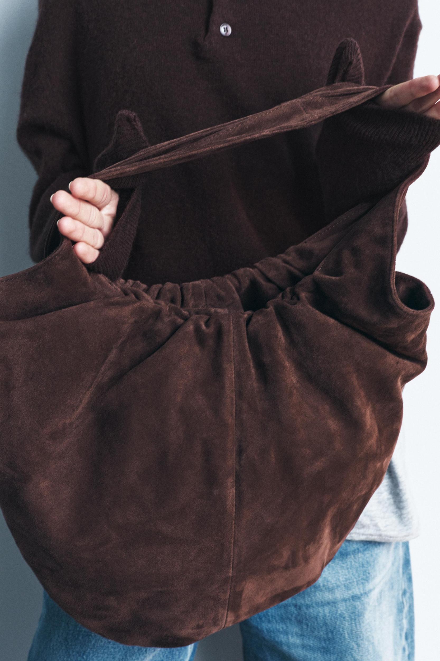 RUCHED SPLIT LEATHER BUCKET BAG Product Image