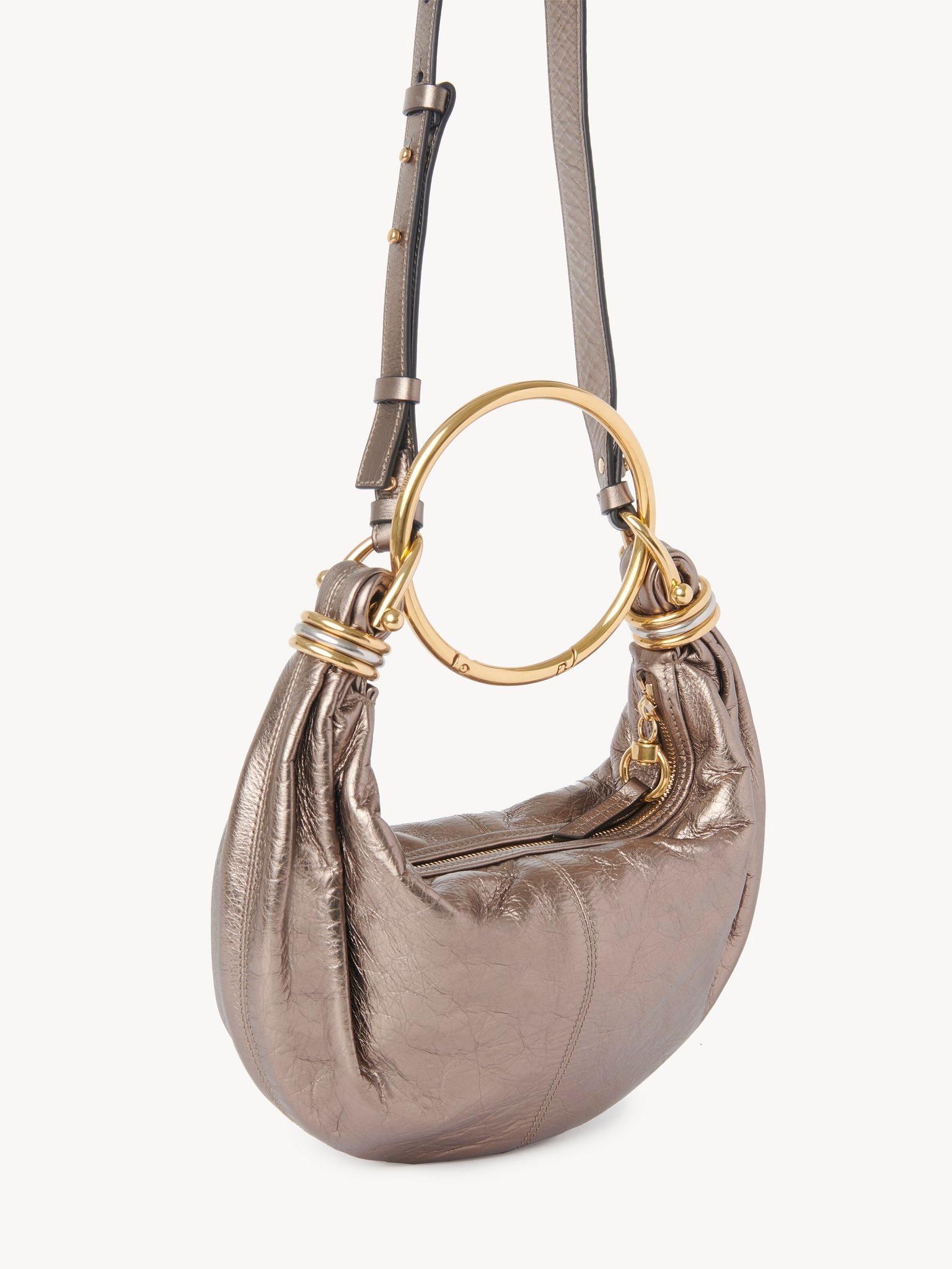 Small Bracelet Hobo bag in metallized leather Product Image