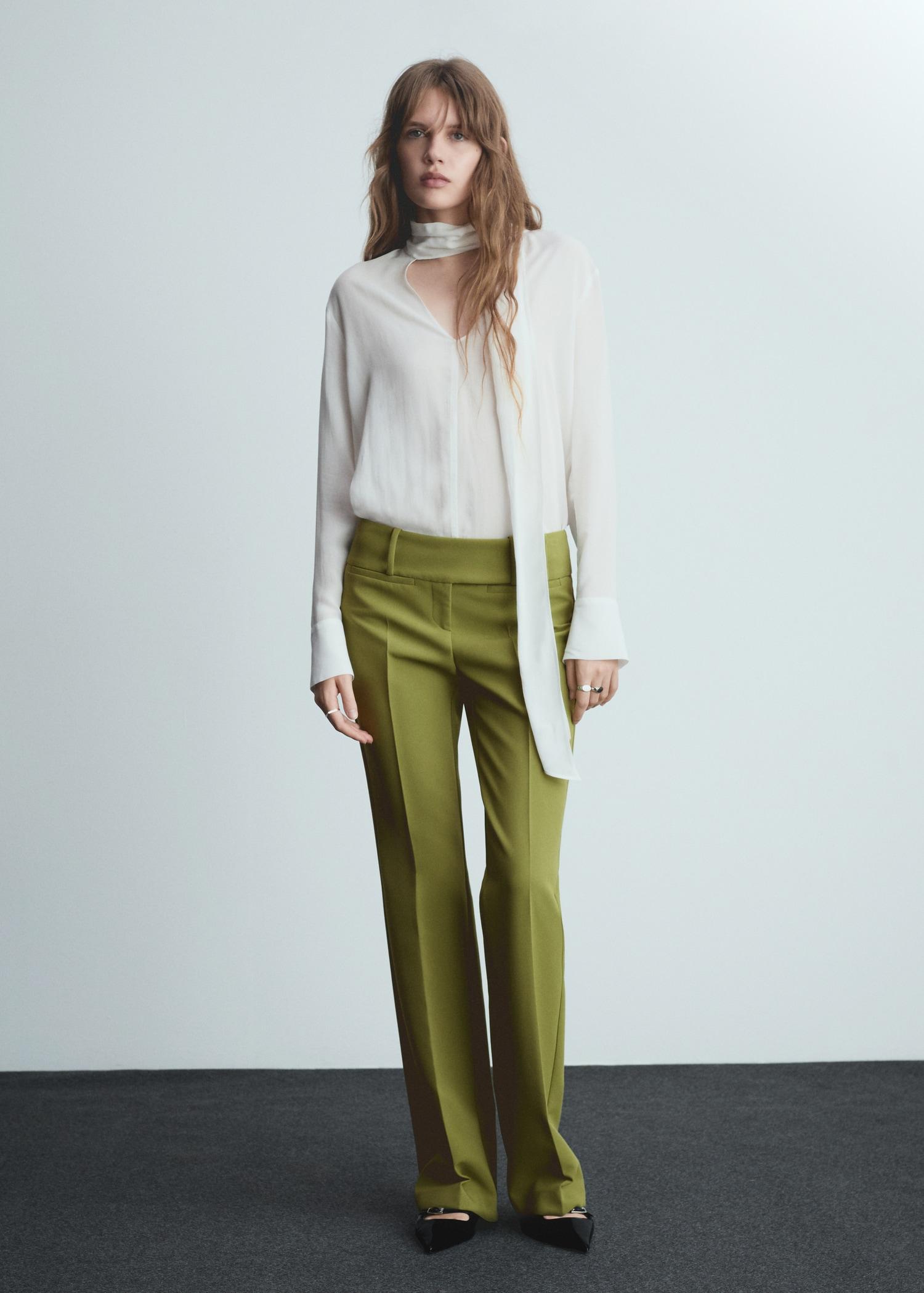 Low-rise flared pants - Women | MANGO USA Product Image