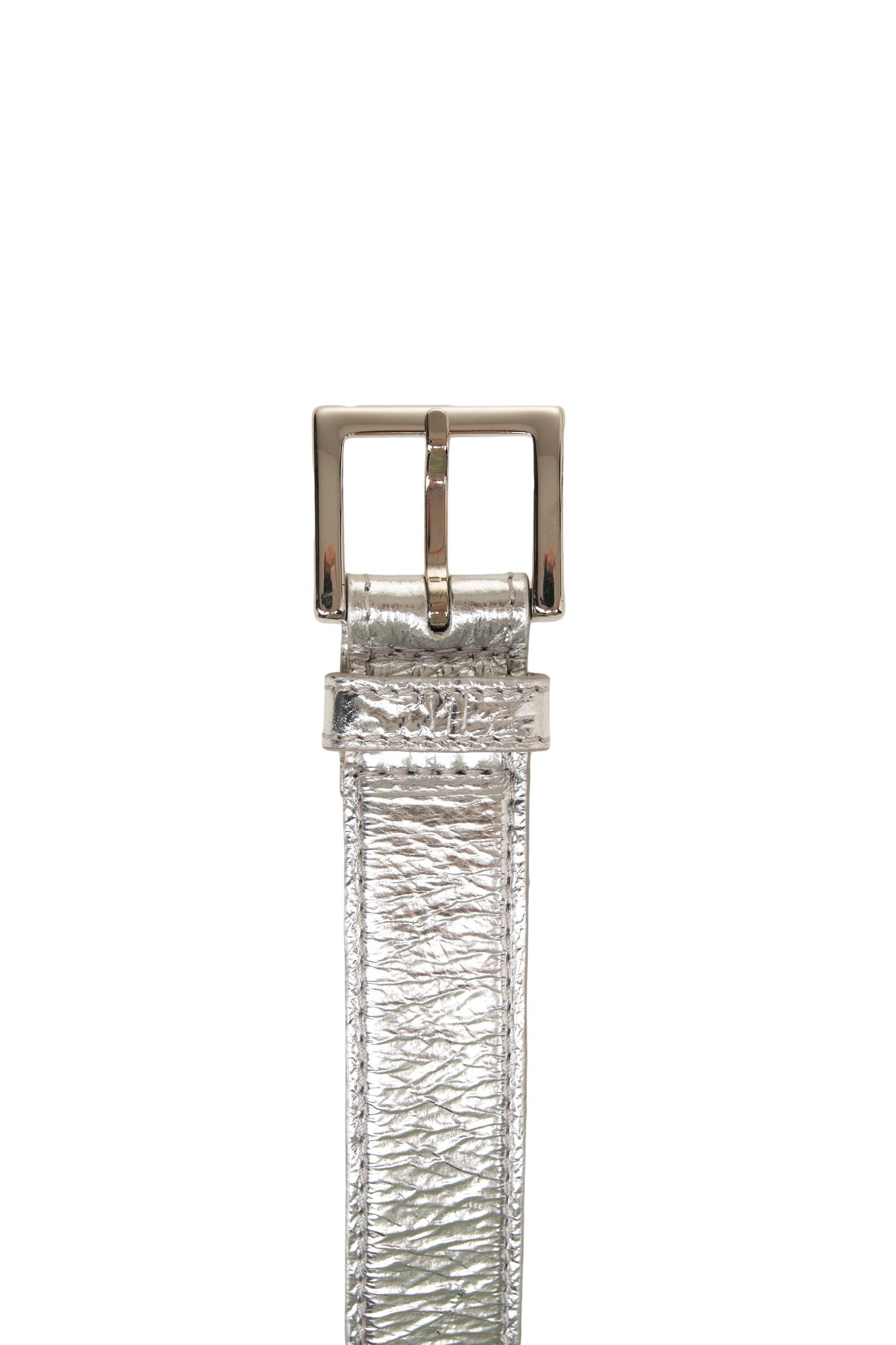 Leather belt in metallic-look Product Image