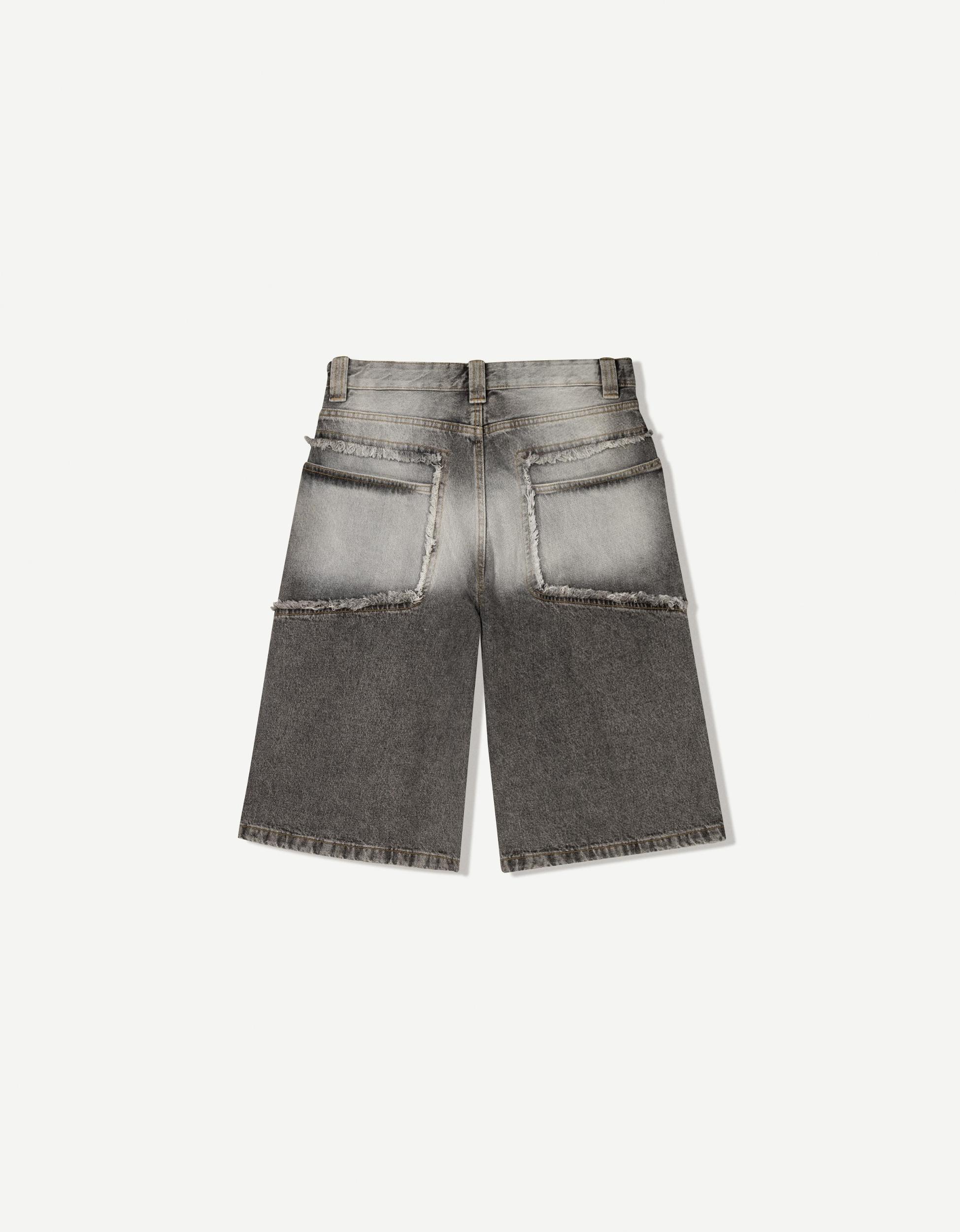 Baggy denim Bermuda shorts with fringing Product Image