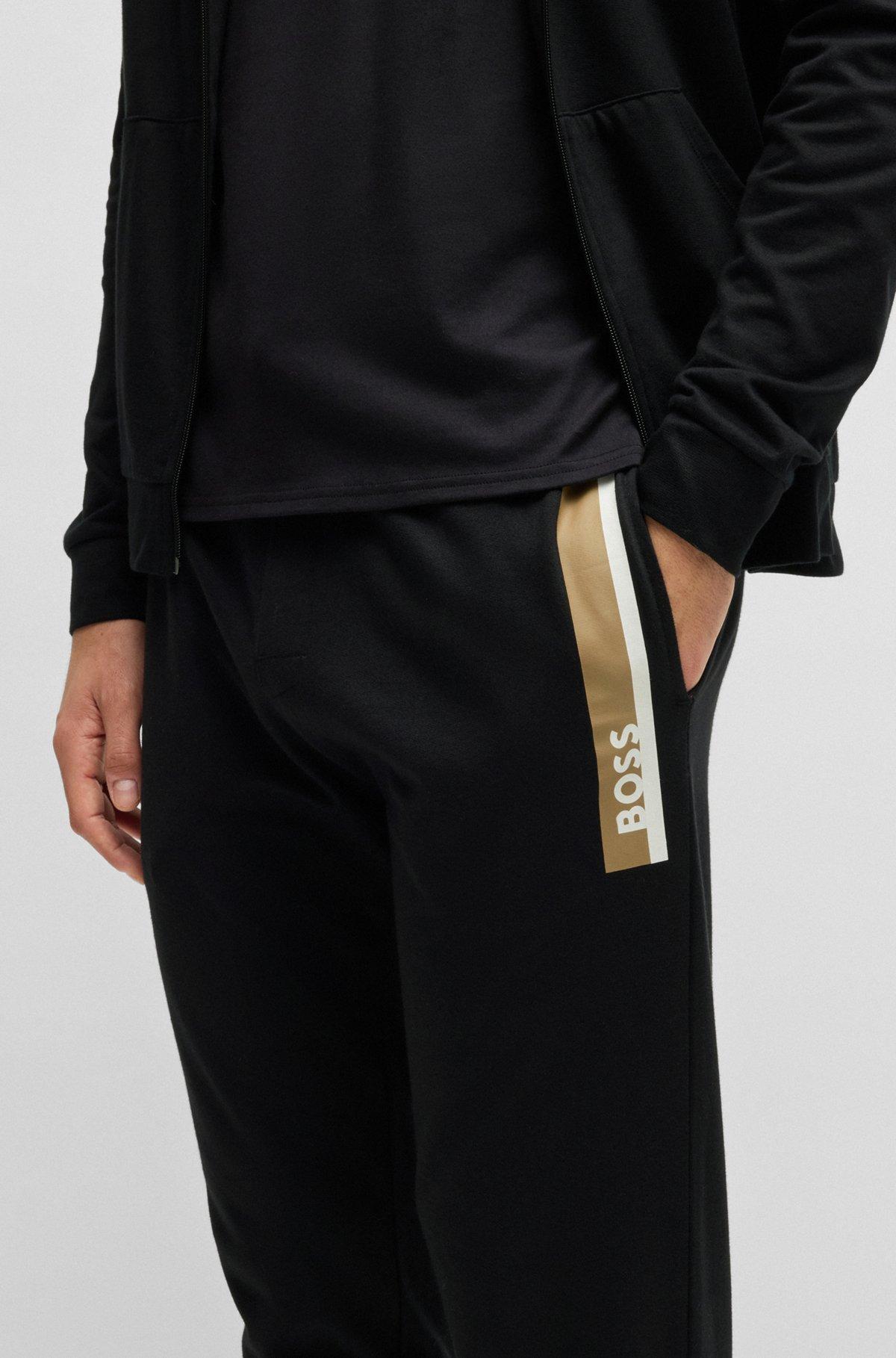Cotton-terry tracksuit bottoms with stripe print Product Image