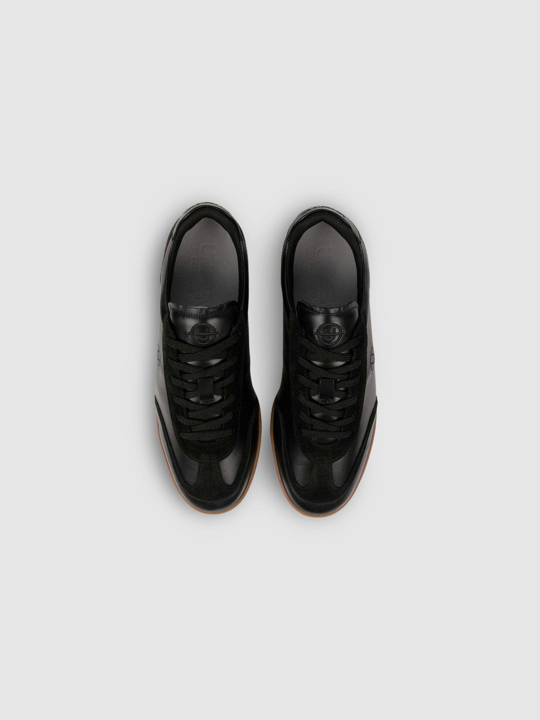 Unseen Footwear Leather Suede Trainers in Black Product Image