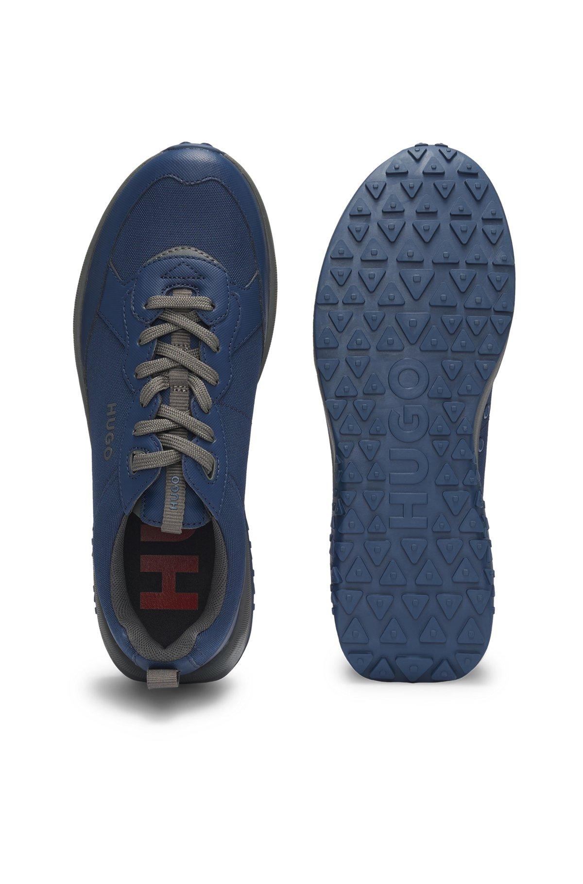 Mixed-material trainers with logo-tape trim Product Image