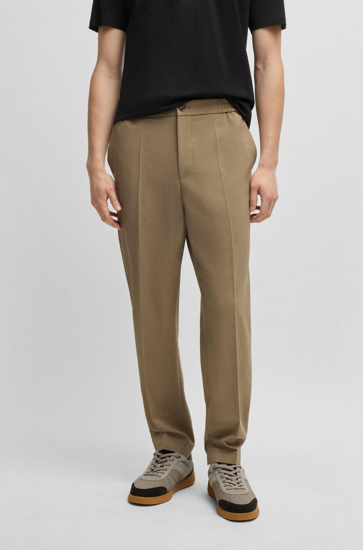 Slim-fit trousers in melange wrinkle-resistant fabric Product Image
