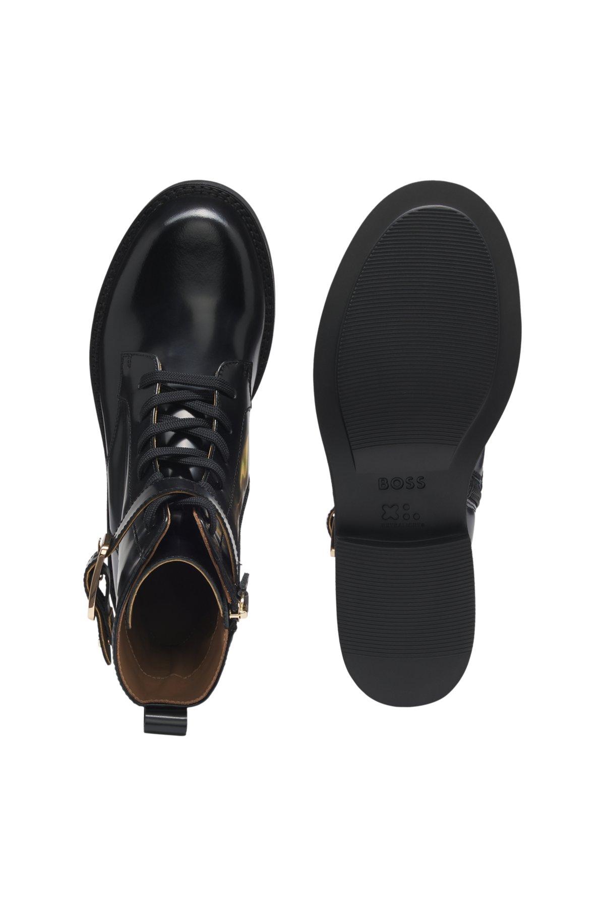 Buckle-detail boots in leather Product Image