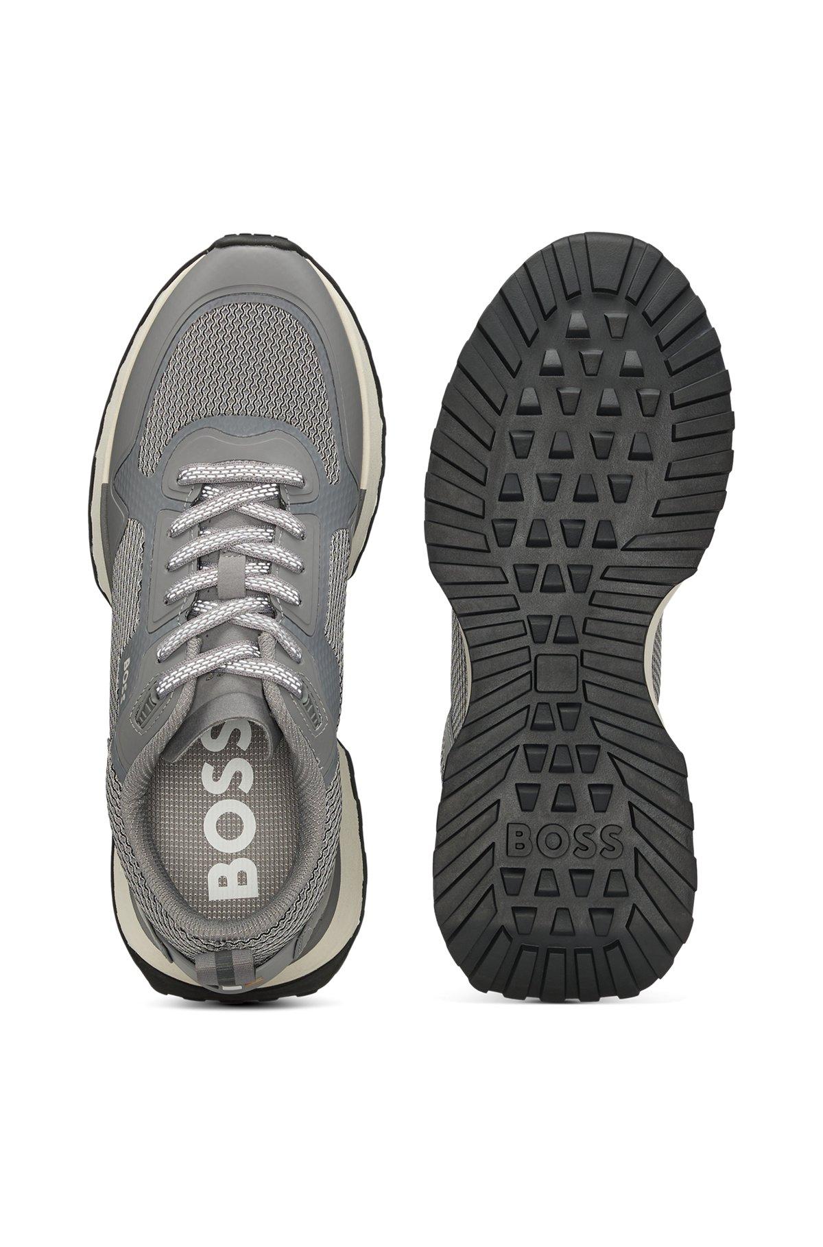 Mixed-material trainers with mesh details and branding Product Image