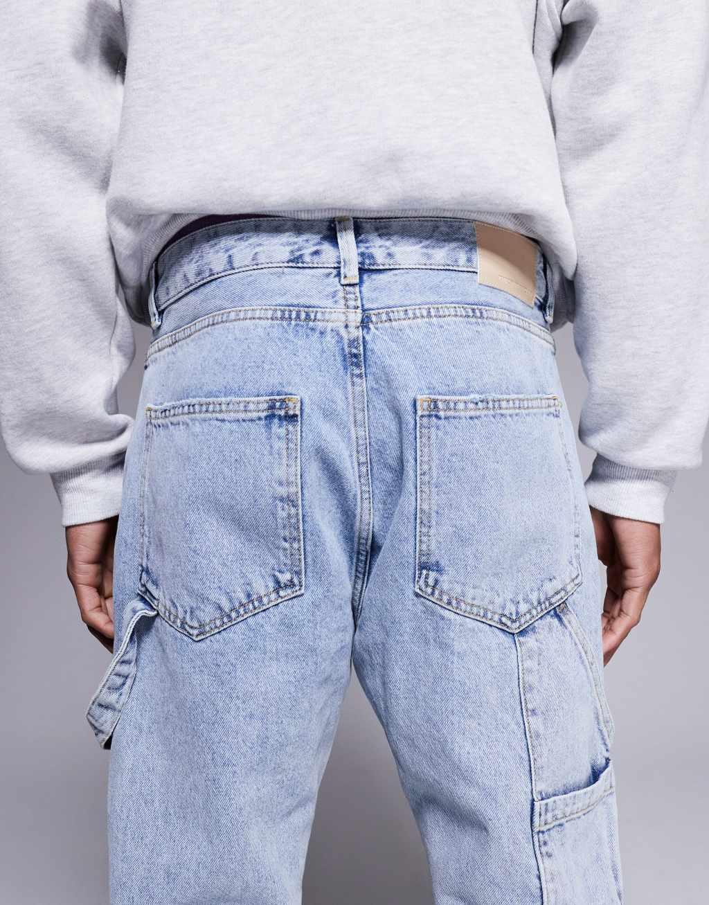 The Couture Club carpenter rivet detail jeans in blue wash  Product Image