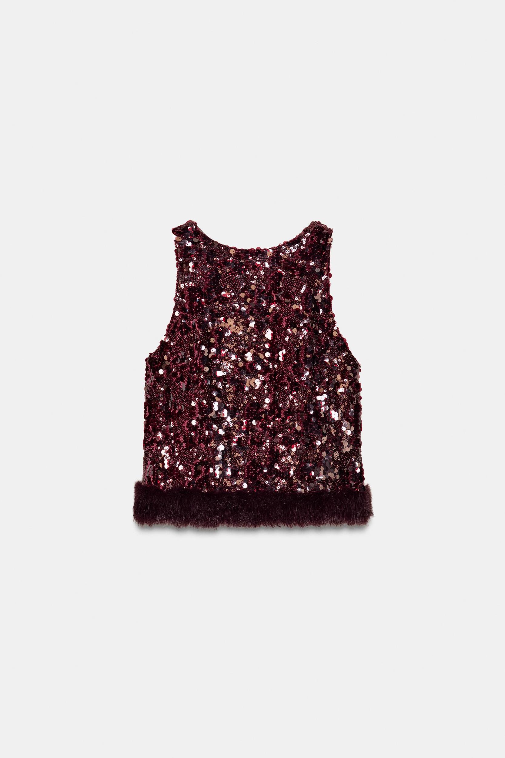 SEQUIN TOP WITH FAUX FUR HEM Product Image