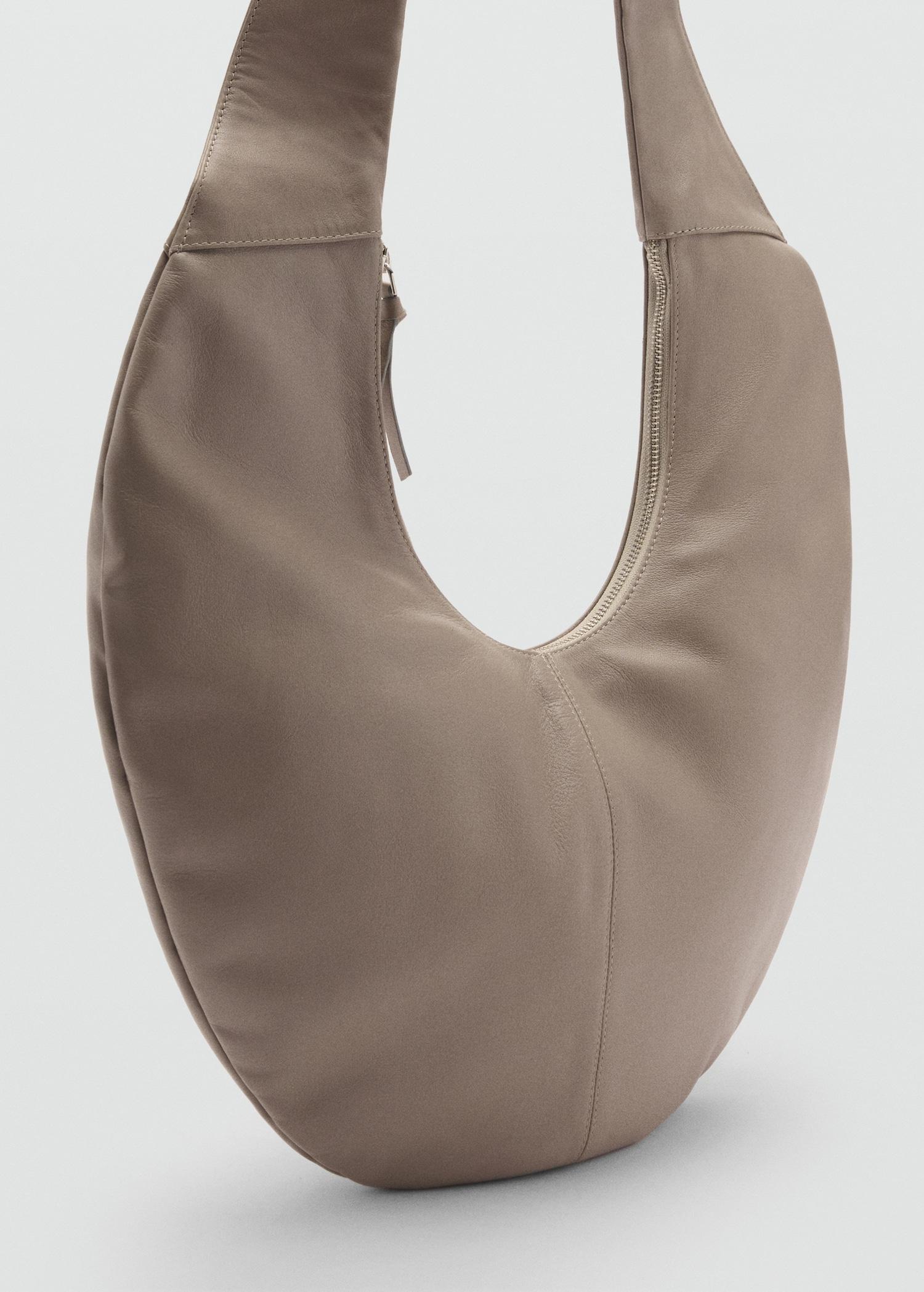 Half-moon leather bag - Women | MANGO USA Product Image