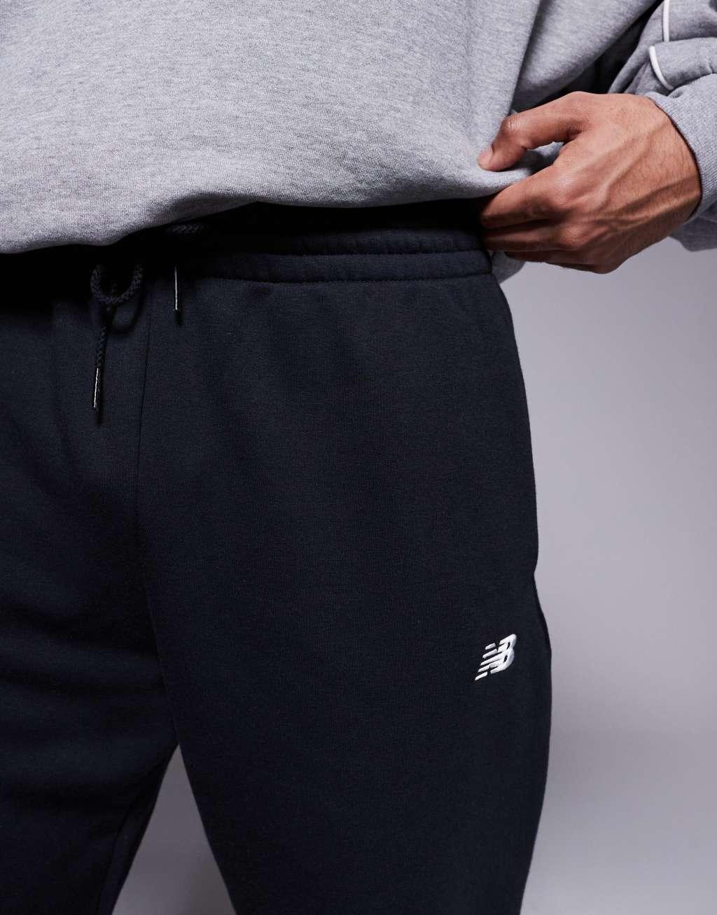 New Balance Sport Essentials Fleece track pants in black Product Image