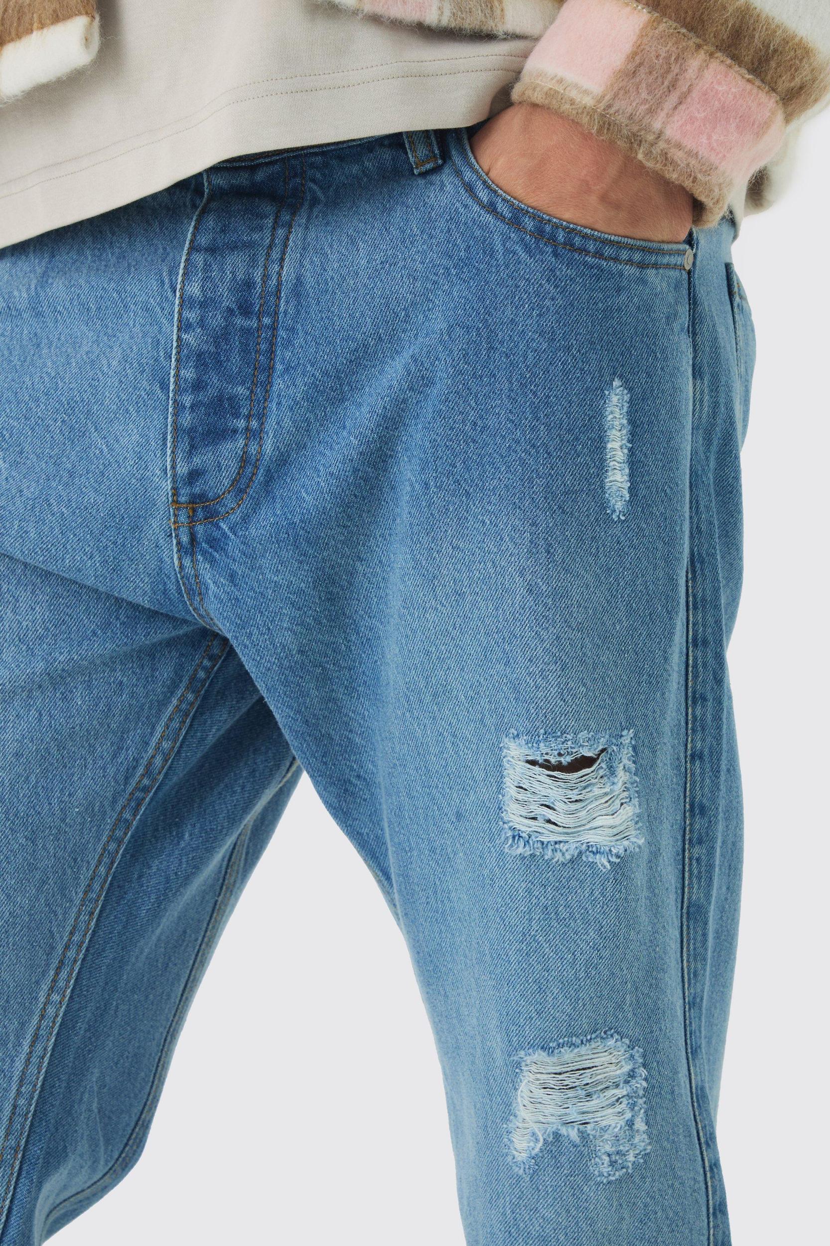 Slim Fit Flared Ripped Knee Jeans With Let Down Hem | boohooMAN USA Product Image