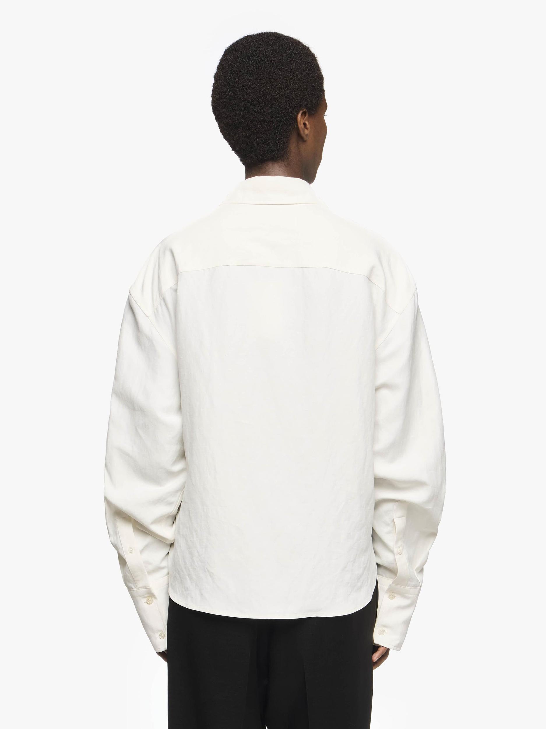 DRAPED TWISTED SHIRT Product Image