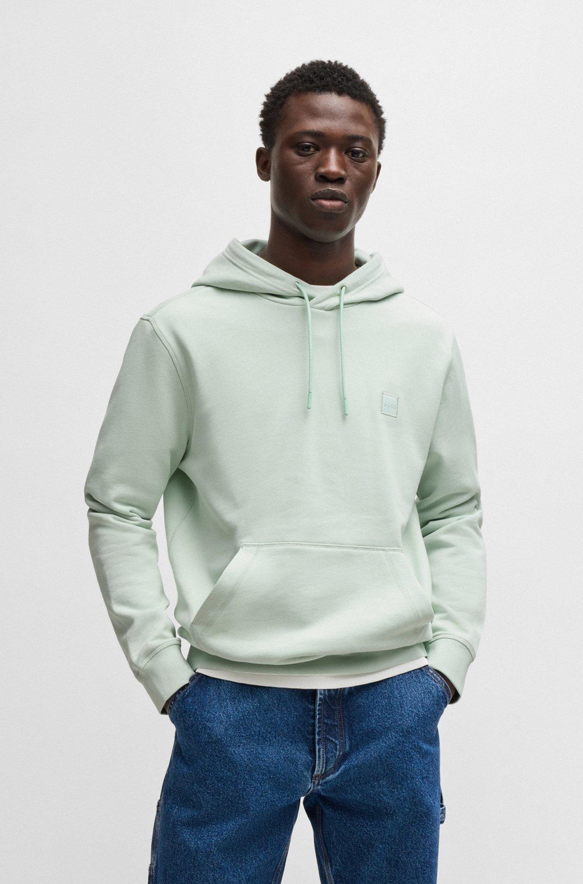 Cotton-terry hoodie with logo patch Product Image