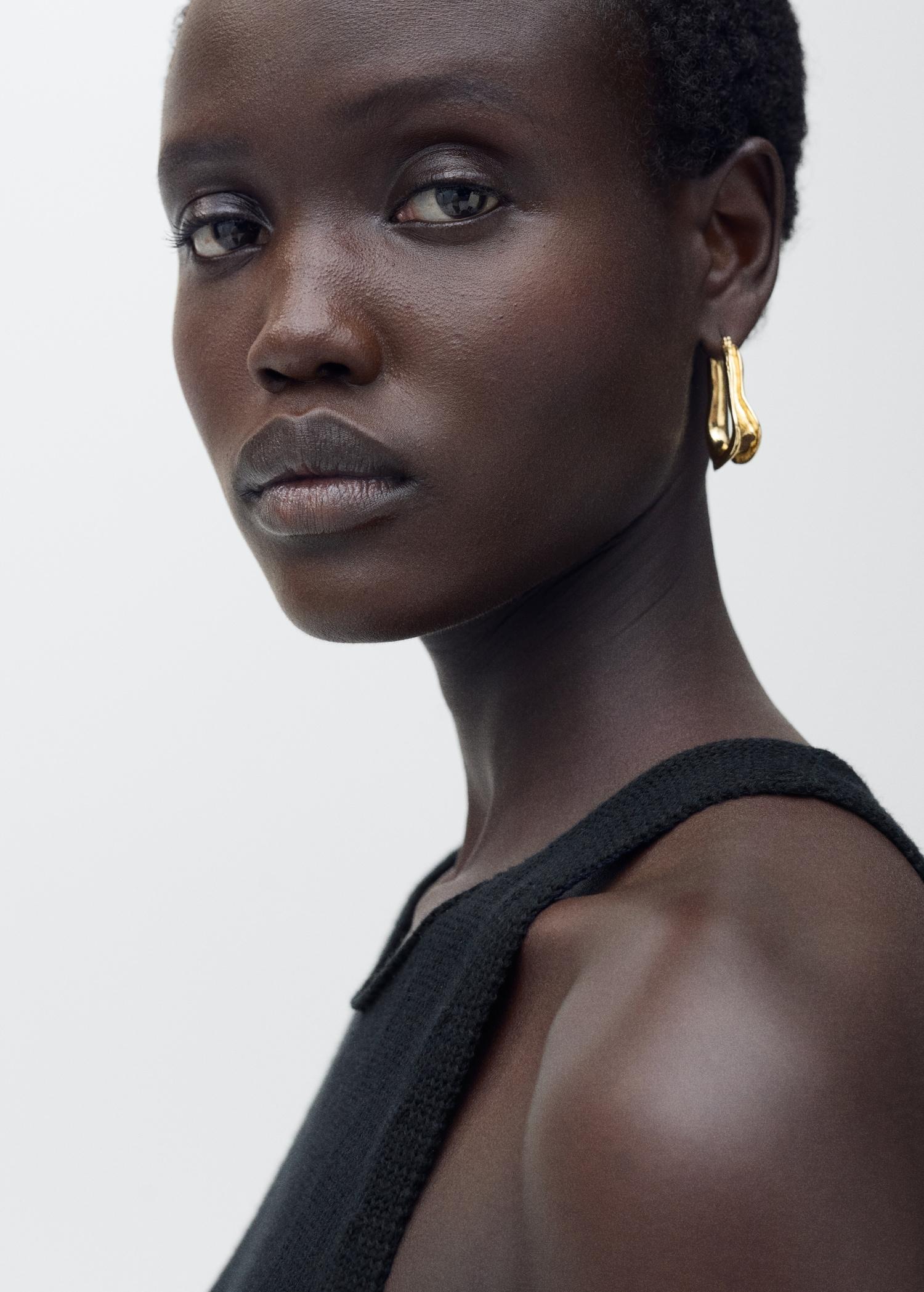 Combined-fabric jumpsuit with belt - Women | MANGO USA Product Image