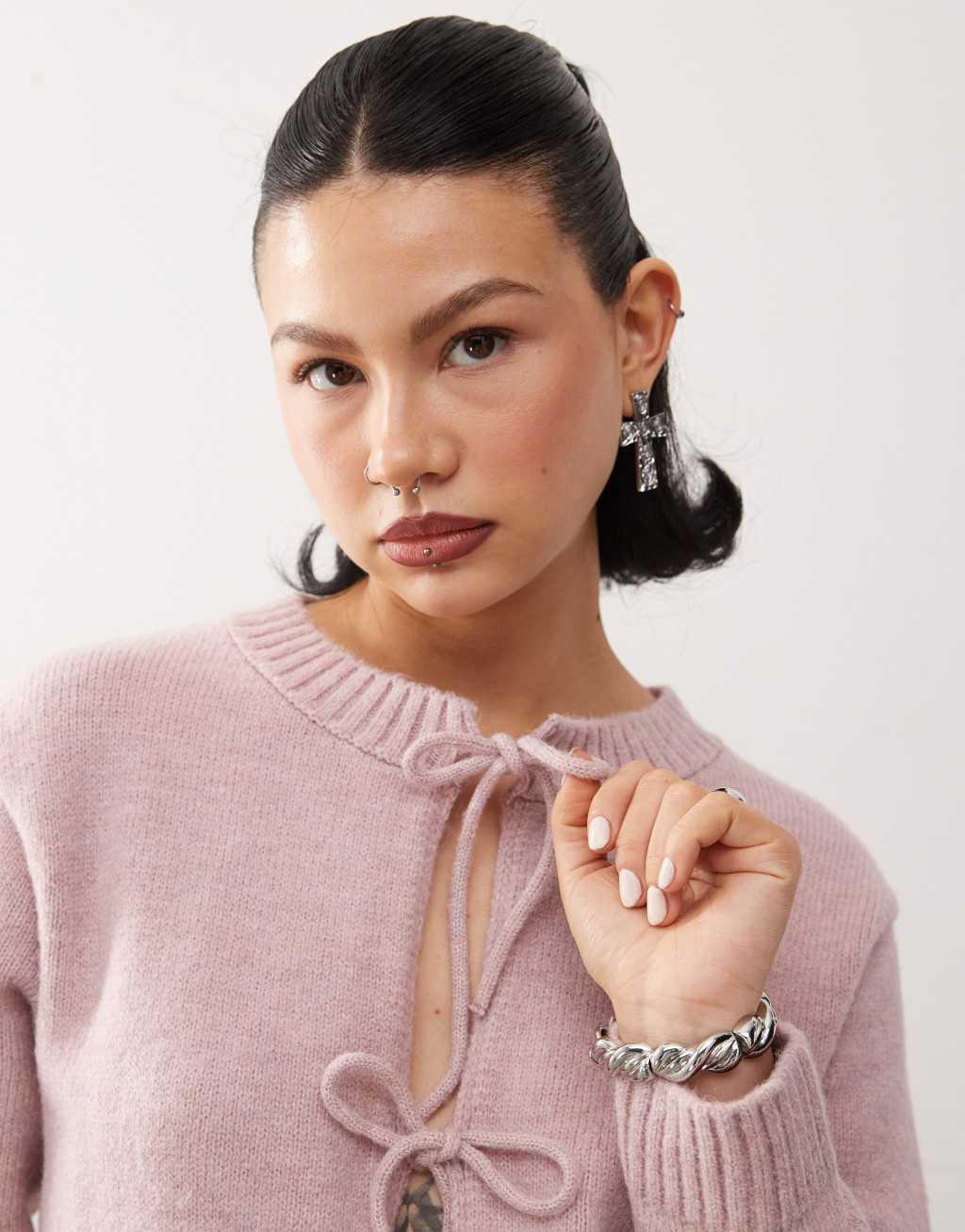 Reclaimed Vintage bow tie front knit cardigan in pink Product Image