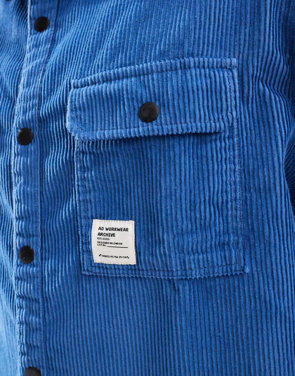 ASOS DESIGN boxy cord overshirt in blue with badge detail Product Image
